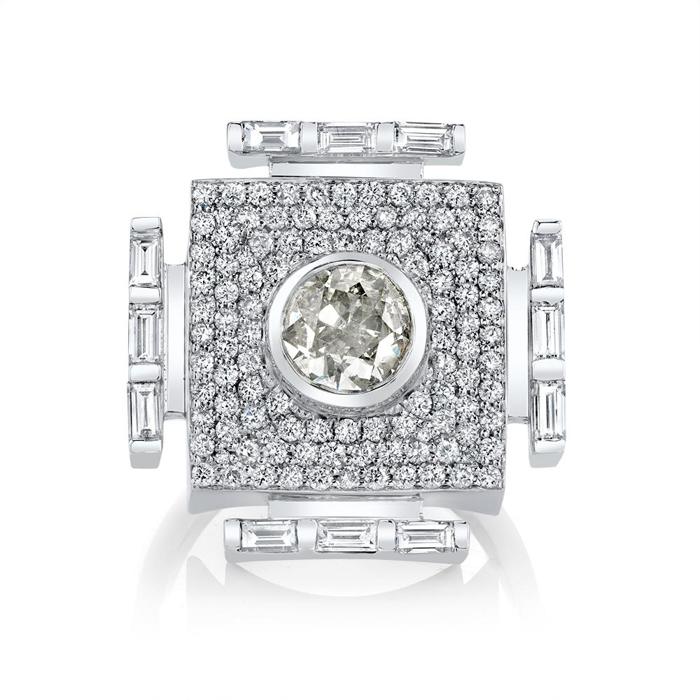 A one-of-a-kind 18K Solid White Gold All Diamond Cocktail Ring from ARK Fine Jewelry Gateways Collection. This ring features a 0.94ct H-I Old European Cut Diamond Center with 0.80cttw Pave Diamonds and 0.76cttw Baguette Diamonds.
This Ring is an