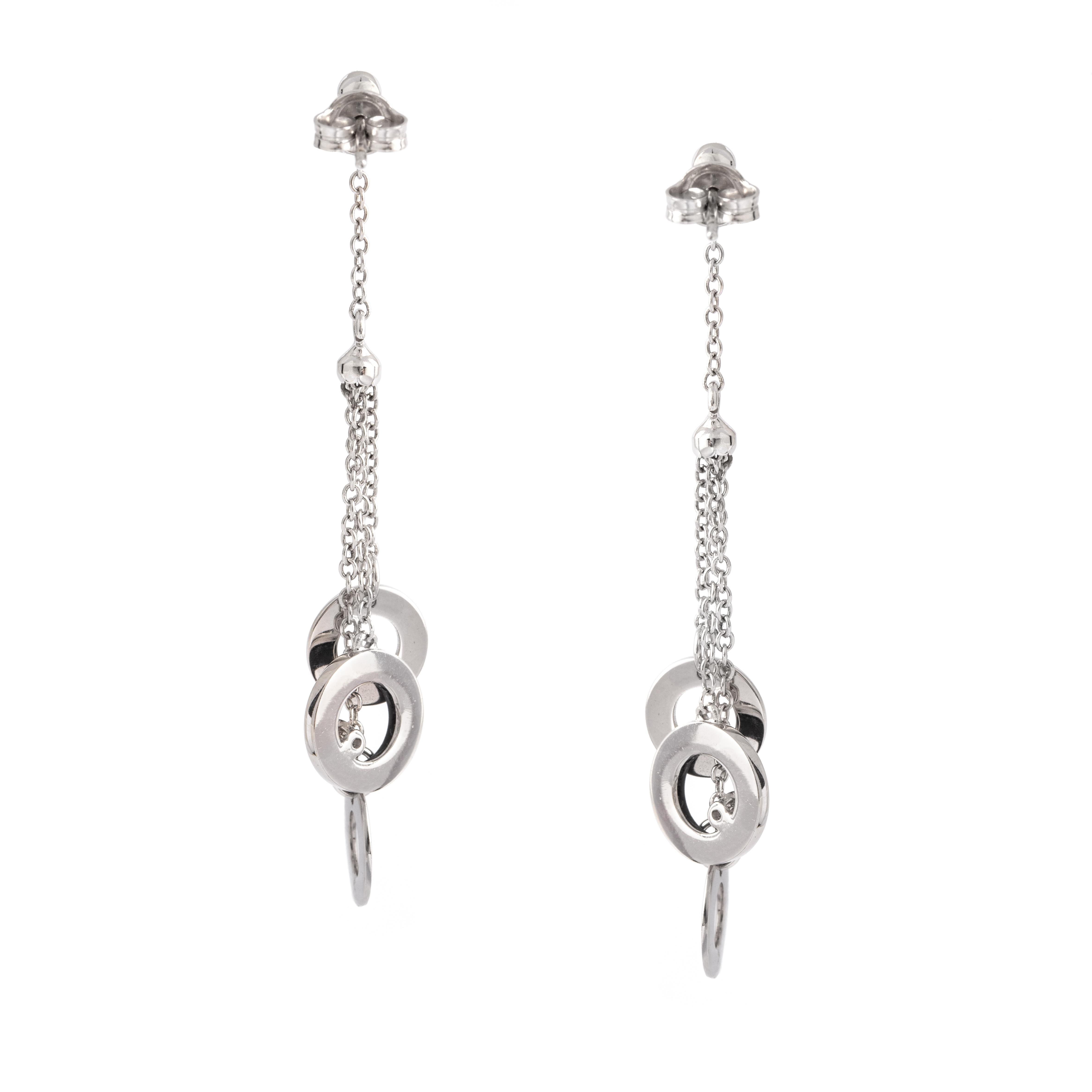 Diamond White Gold Earrings.
2 round cut diamond 0.06 carat.
Total weight: 6.44 grams.
Length: 6.20 centimeters.
Width: 0.30 centimeters up to 1.10 centimeters.
