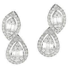 Boucles d'oreilles or blanc et diamants