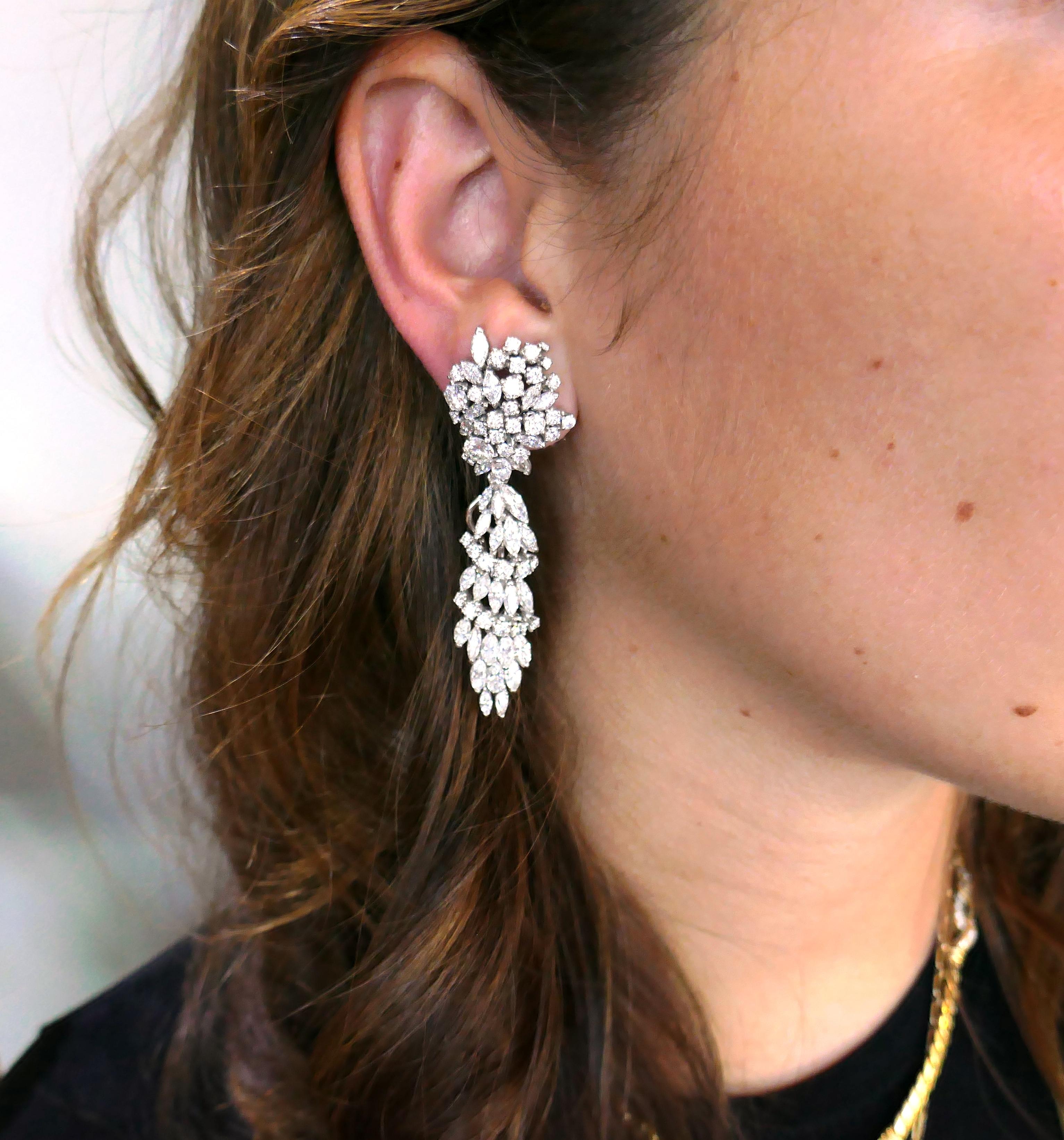 Lovely Day & Night dangle earrings with removable bottom parts (see pictures 2 and 3). Versatile, timeless, feminine and wearable, the earrings are a great addition to your jewelry collection. 
The earrings are made of 18 karat (stamped and tested)