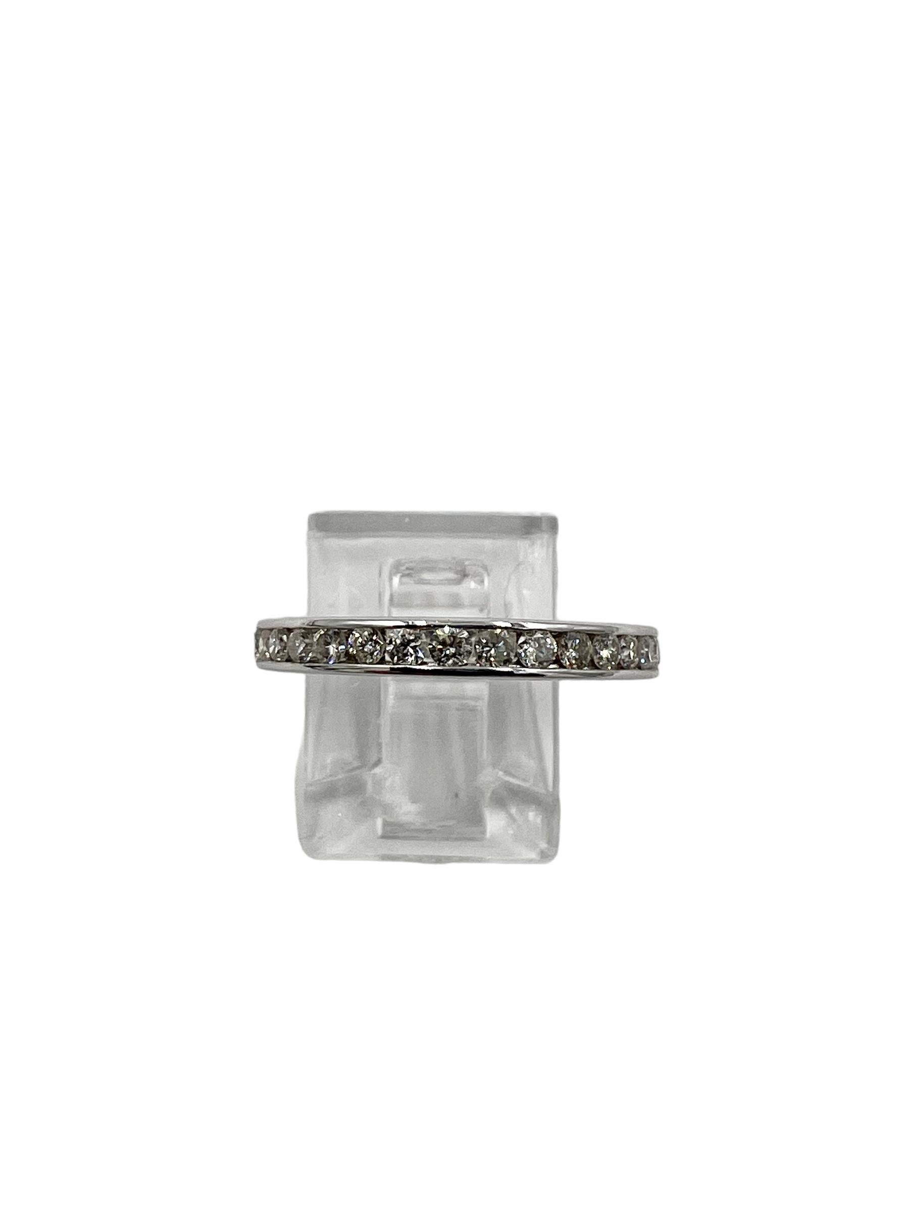 Diamond white gold eternity band, size 8.25

SPECIFICATIONS:

DIAMONDS:  Thirty-two round brilliant channel set diamonds totaling
 approximately 1 carat ( approximately SI clarity, H-J color).

METAL:  14k white gold

WEIGHT:  2.3 grams

SIZE: 