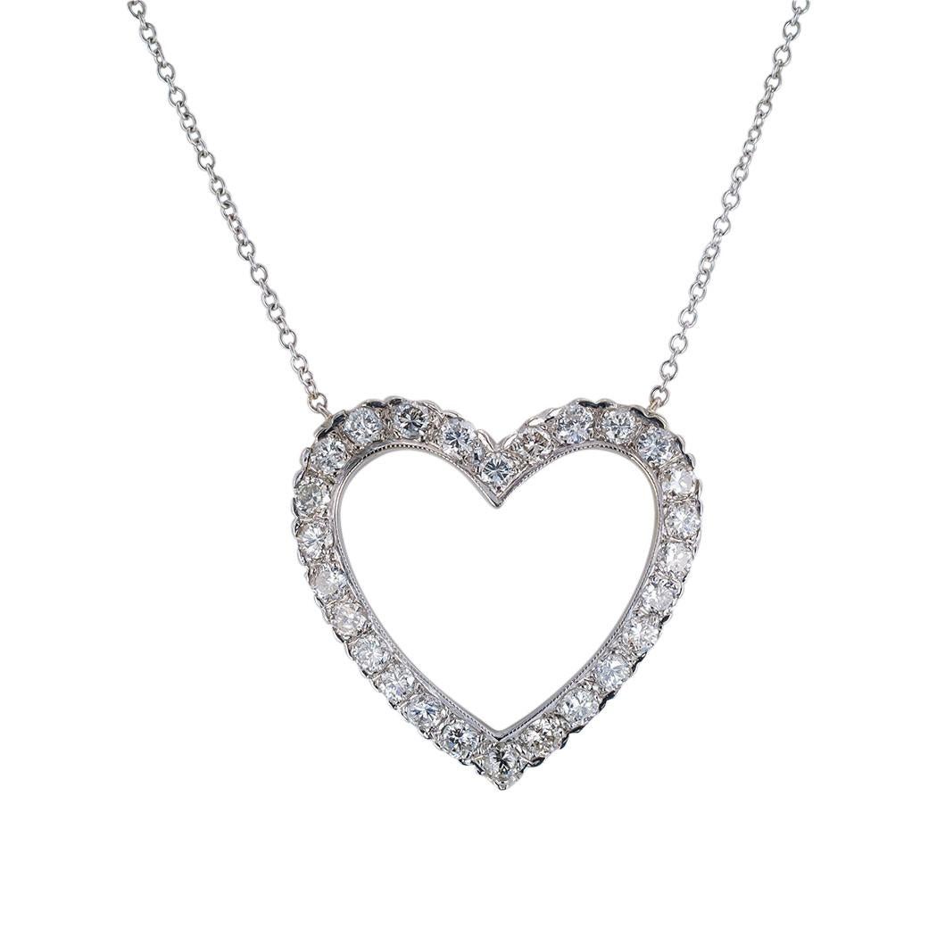 Estate diamond and white gold heart shaped pendant necklace circa 1950.   Love it because it caught your eye, and we are here to connect you with beautiful and affordable jewelry.  It is time to claim a special reward for Yourself!  Clear and