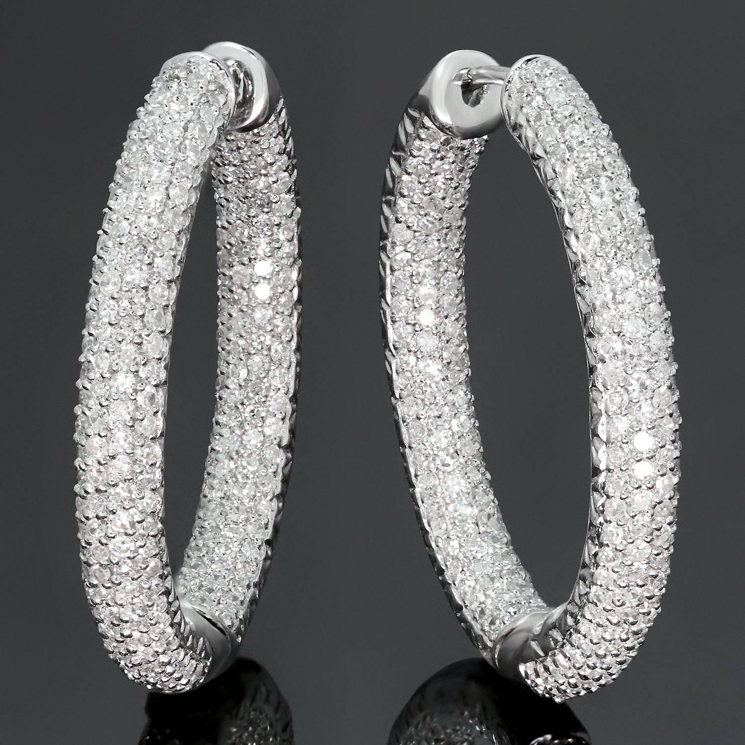 These gorgeous hoop earrings are crafted in 18k white gold and set with approximately 428 brilliant-cut round diamonds of an estimated 3.00 carats. Made in United States circa 2010s. Measurements: 0.15