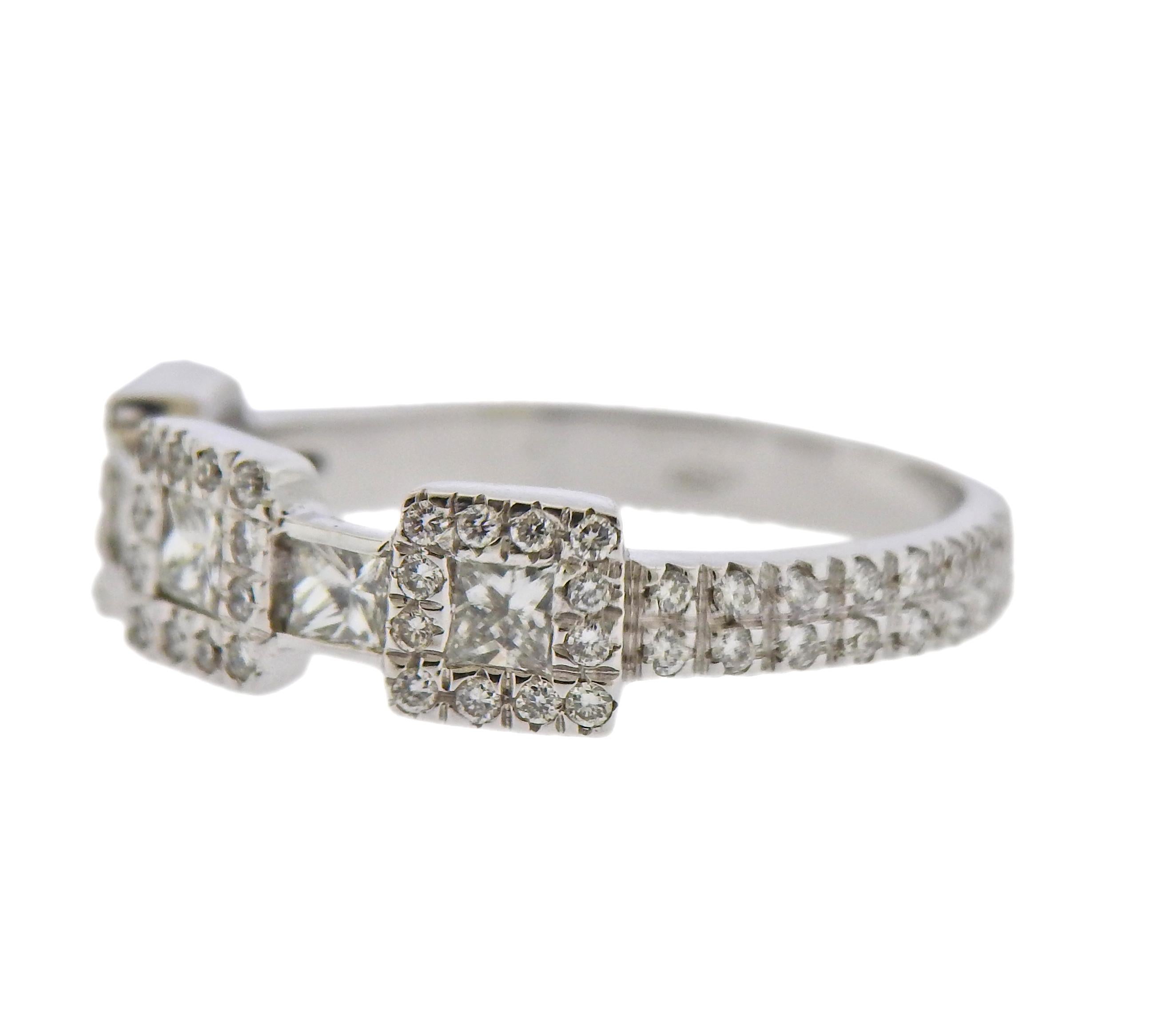 Modern 18k white gold ring, with approx. 0.76ctw in diamonds. Ring size - 7, ring top is 5.7mm wide. Marked 750, and with Italian mark. Weight - 3.8 grams.