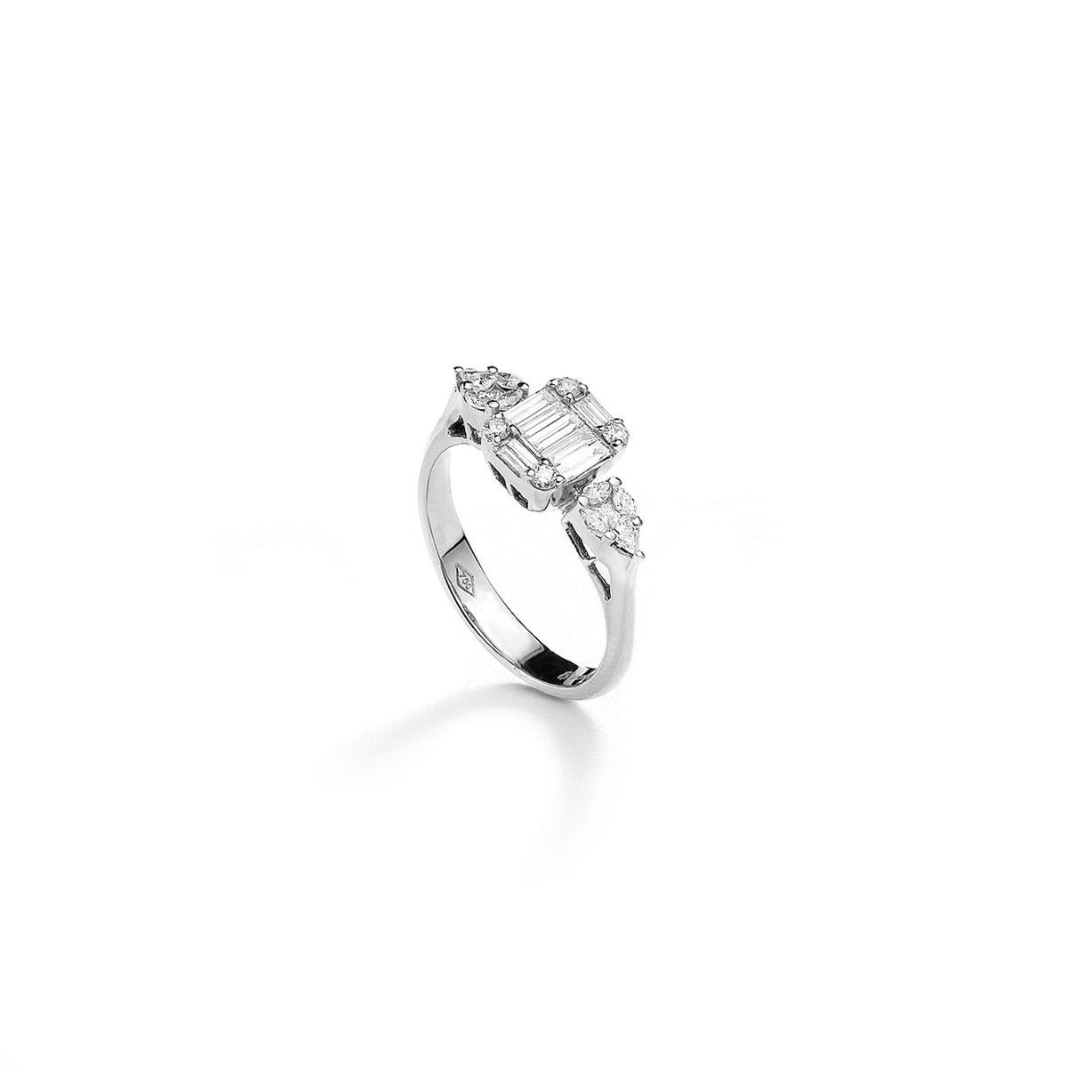 Ring in 18kt white gold set with 20 princess, marquise, pear shaped and baguette cut diamonds 0.53 cts and 4 diamonds 0.08 cts Size 53

Total weight: 3.76 grams