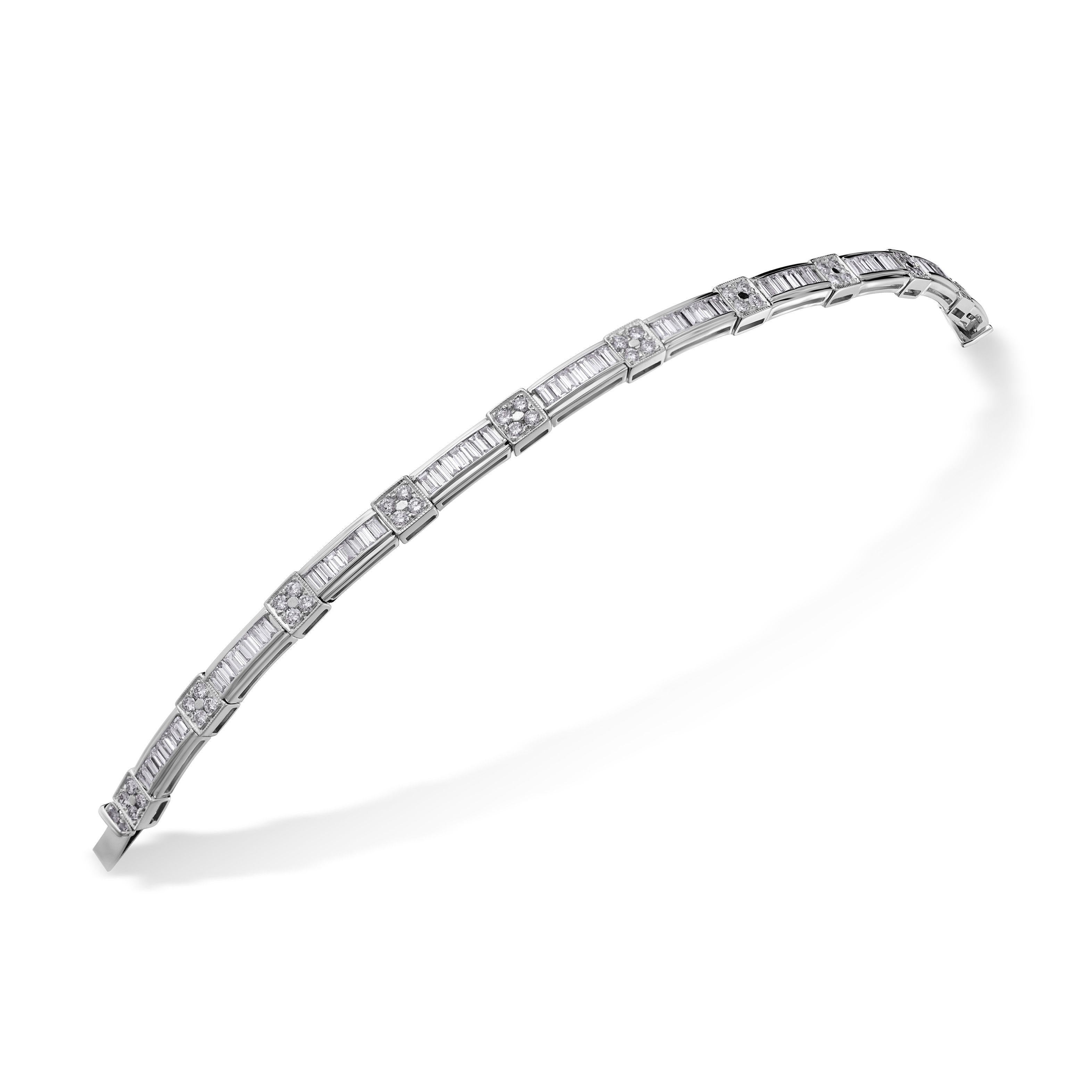 Simply Beautiful! Elegant and finely detailed Art Deco Revival Diamond Semi-Articulated White Gold Bracelet. Decorated with 10 square links, each adorned with 4 round Brilliant-cut Diamonds. Each link is separated with 1 horizontal rectangle,