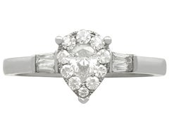 Diamond White Gold Solitaire Ring with Accents