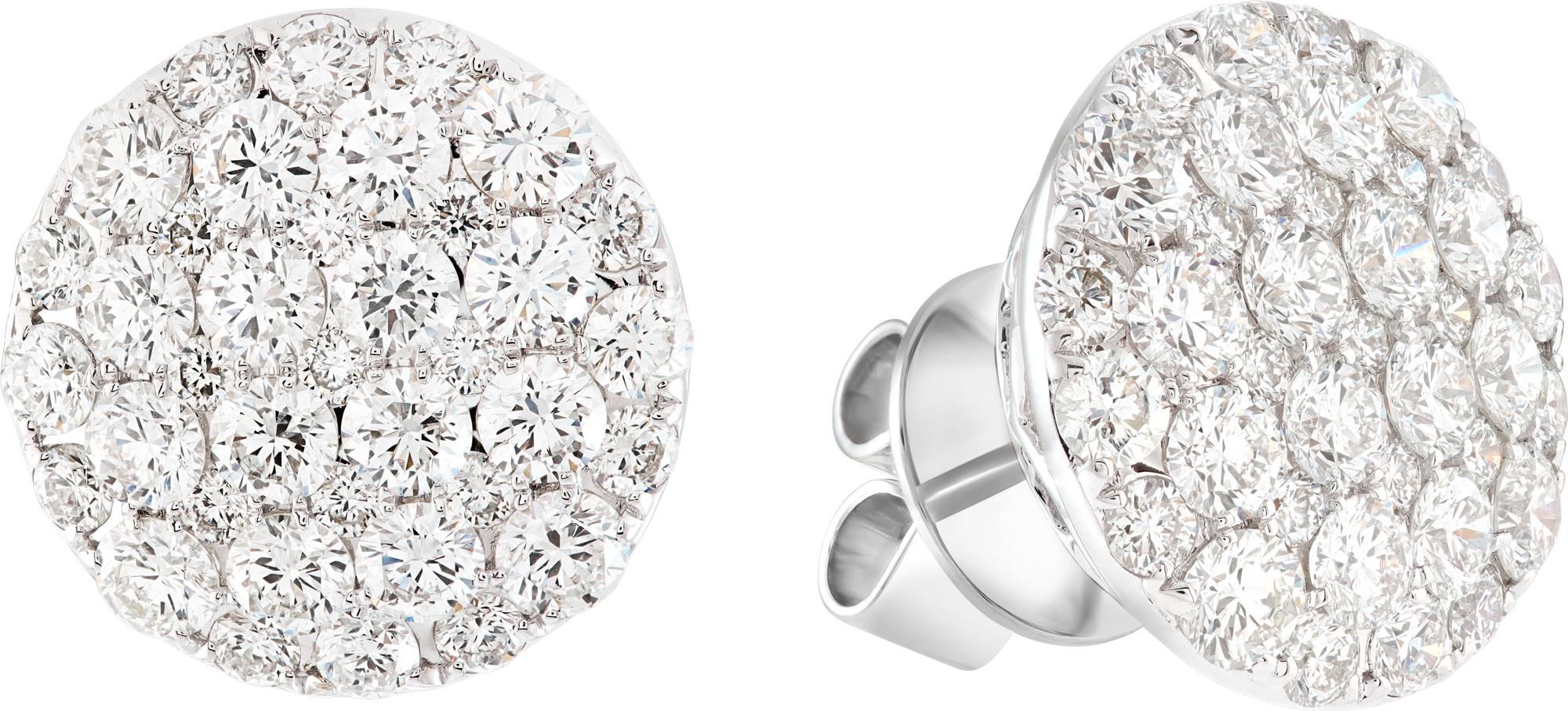 Diamond studs in 14k white gold and approximatly: 3.46 carats in V-S clarity G-H color round cut diamonds.