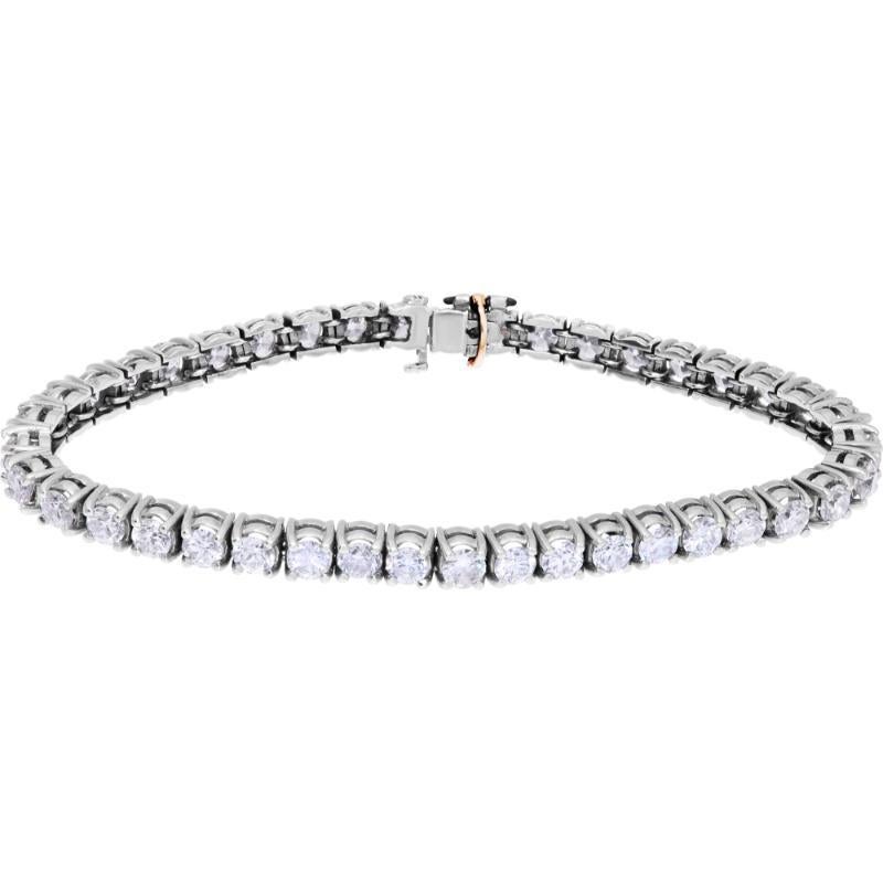 Pulsera tenis de diamantes en oro blanco de 18 quilates con más de 7 quilates en diamantes redondos (color G-H, claridad VS). 7 pulgadas de longitud.