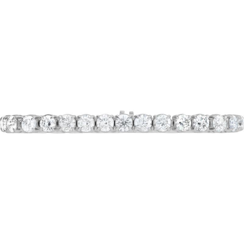 Round cut diamond tennis bracelet in 18k white gold with 13.98 cts in diamonds (H color I1 clarity). 7.25 inch length