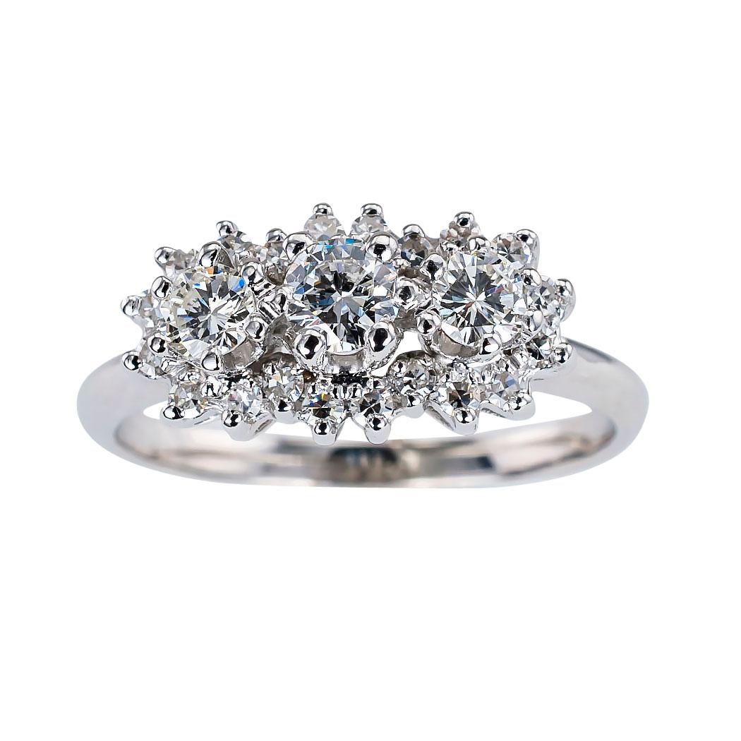 Estate diamond and white gold three stone ring circa 1960.  Love it because it caught your eye and we are here to connect you with beautiful and affordable jewelry.  Make yourself happy!  Simple and concise information you want to know is listed