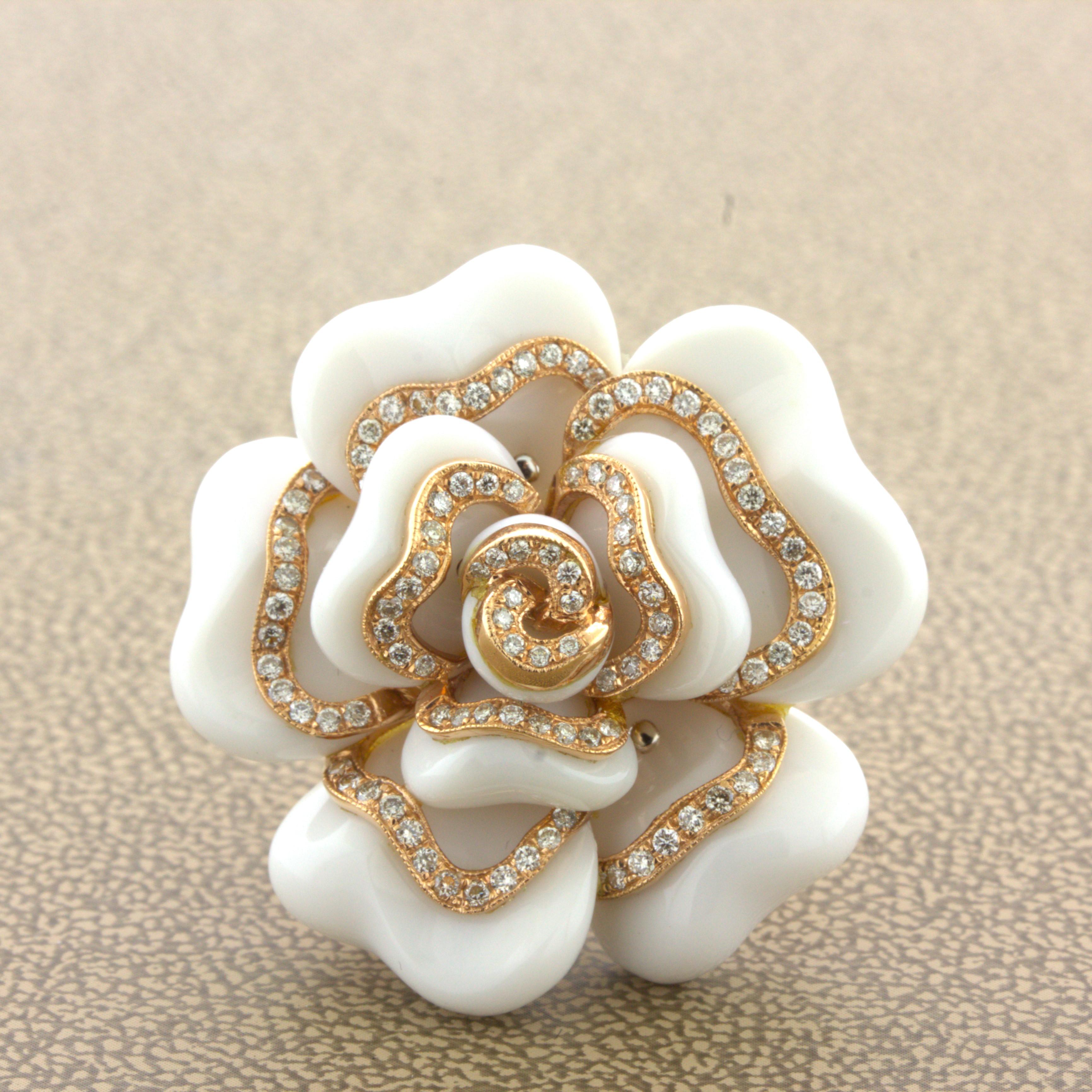 A sweet and fun cocktail ring made of carved white onyx and diamonds. The diamonds weigh 0.58 carats and are set around the pedals of the Camellia. The pedals themselves are made of 34.40 carats of white onyx which has been hand carved and polished