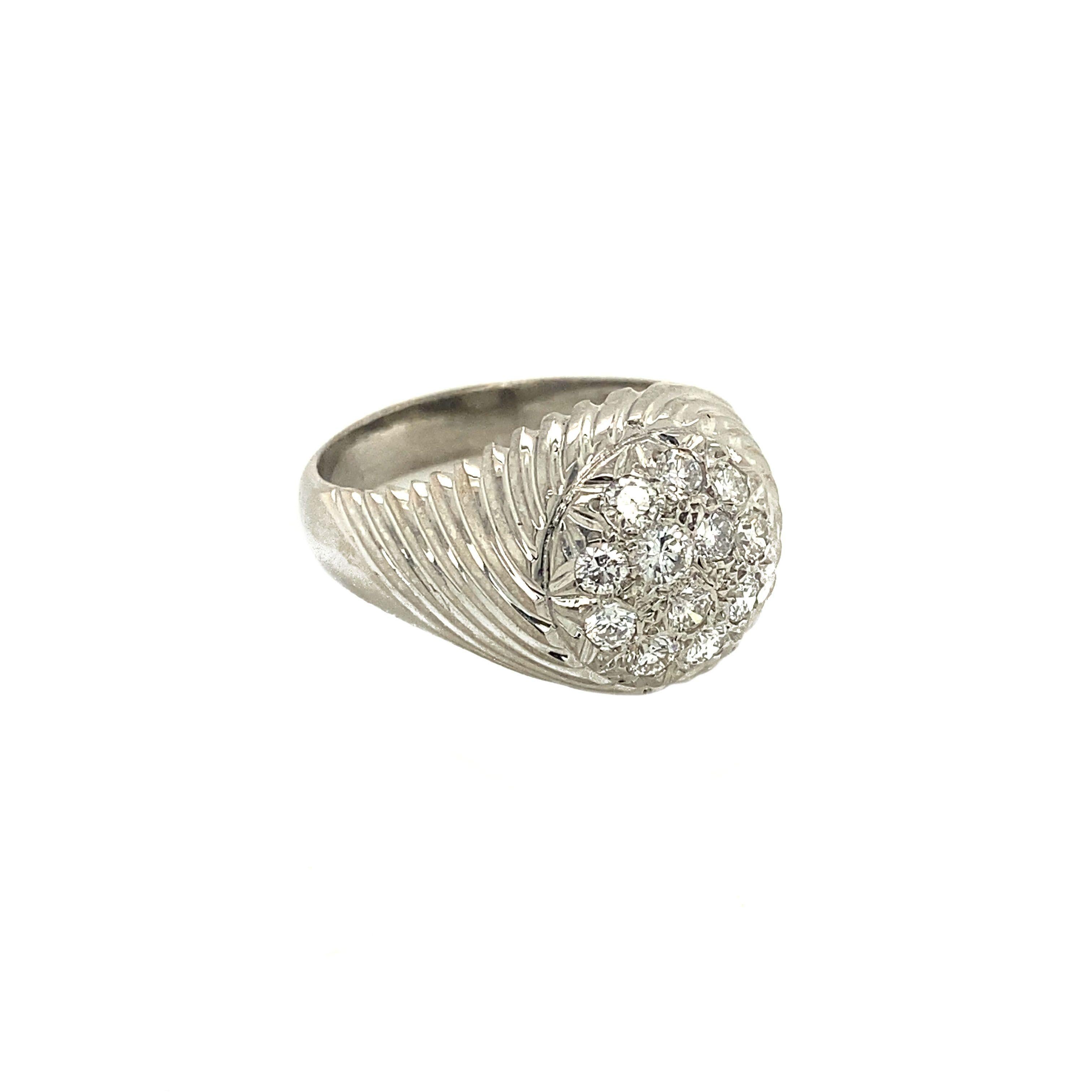 This 18 carat white gold mens ring is set with 12 diamonds of 0.08 ct. The ring size can be adjusted. 

Material: White gold
Quality: 18 carat
Round table diameter: 13.15 mm
diamond: 12x 0.08ct. brilliant cut G VSI
Shin width: 4.45 mm
Weight: 13.9