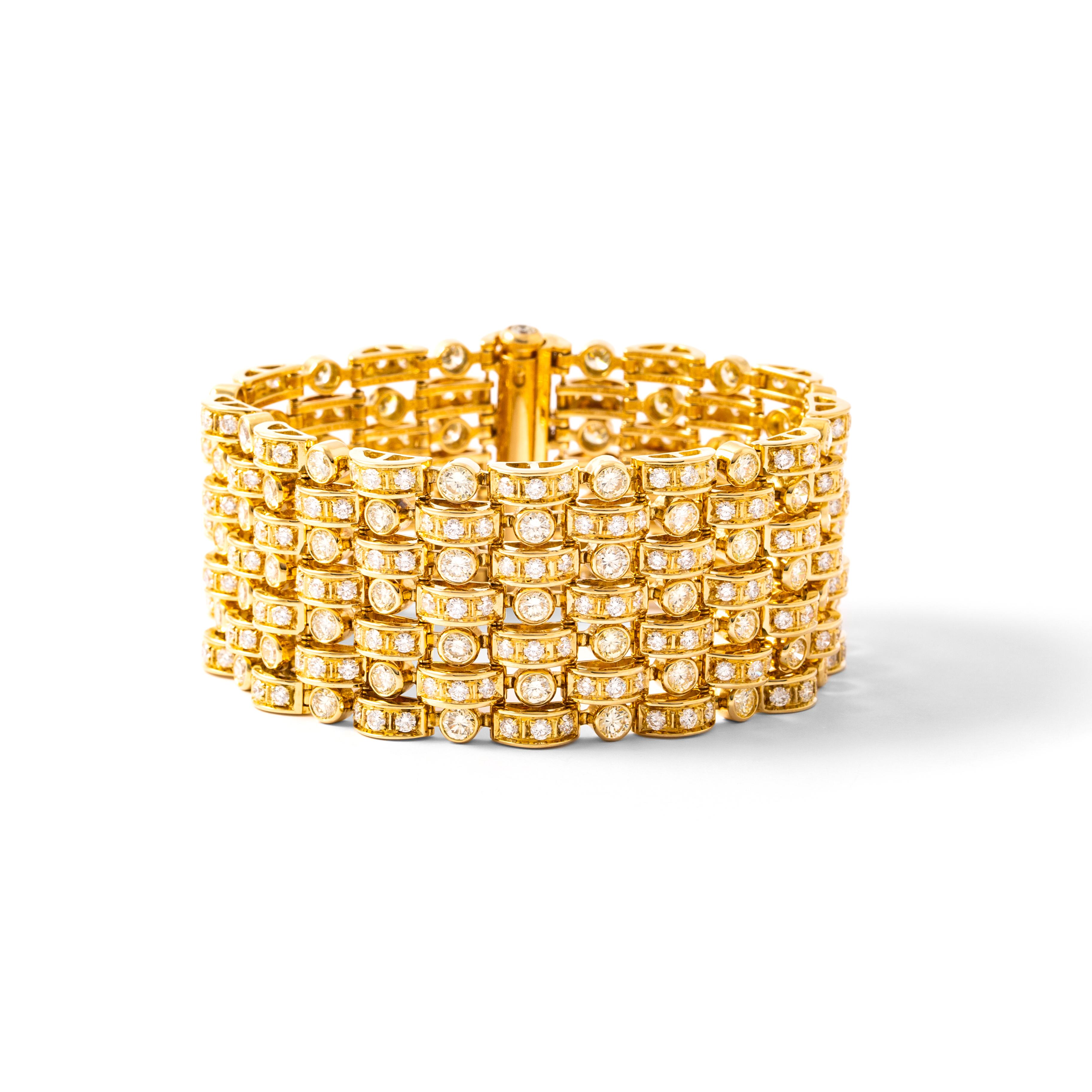 Wide bracelet in 18kt yellow gold set with 338 diamonds 22.60 ct