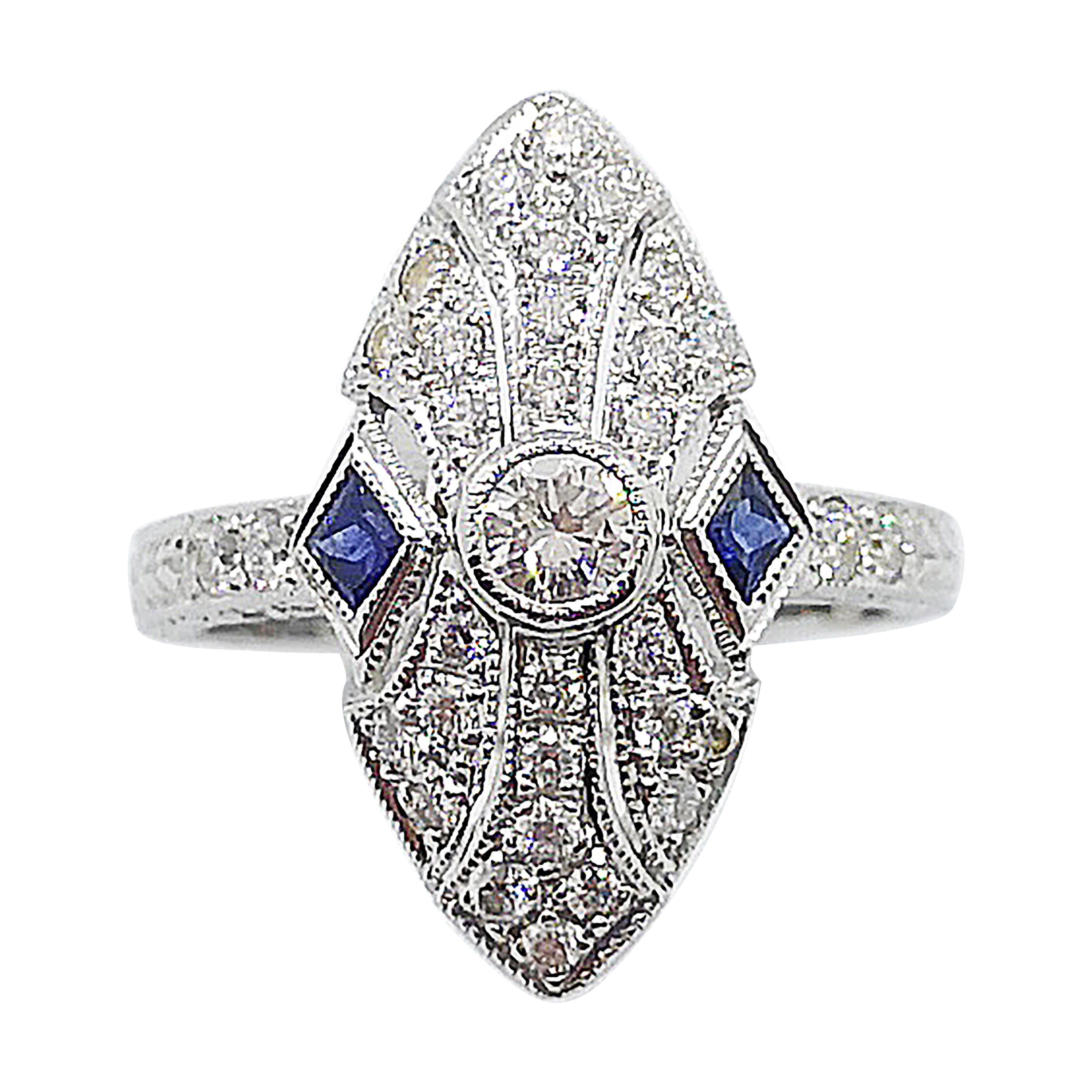 Diamond with Blue Sapphire Ring Set in 18 Karat White Gold Settings For Sale