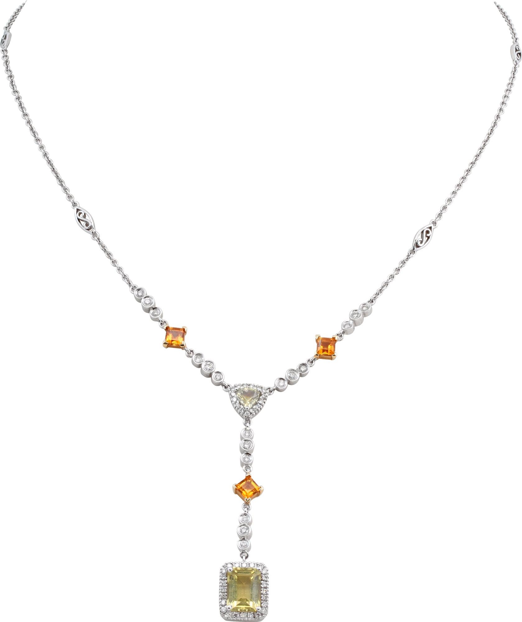 Diamond drop necklace in 14k white gold with diamonds, citrine and goldan topaz. Approximately 0.75 carats in G-H color, SI clarity diamond accents. Length 14 inches plus 1.75 inches drop.