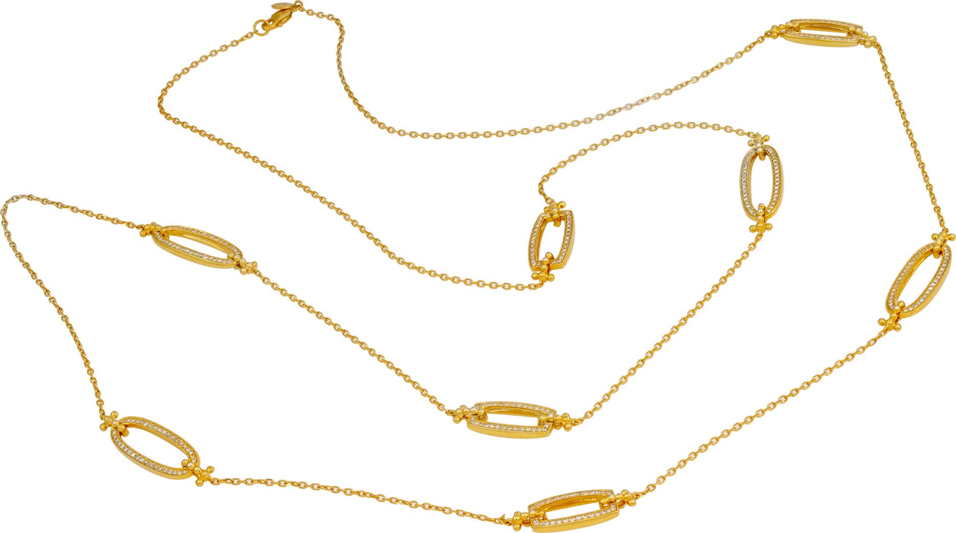 Collier en or jaune 14k avec huit stations de diamants sertis en pavé d'environ 1,50 carats en diamants de couleur G-H et de pureté VS-SI. Longueur 36 pouces.