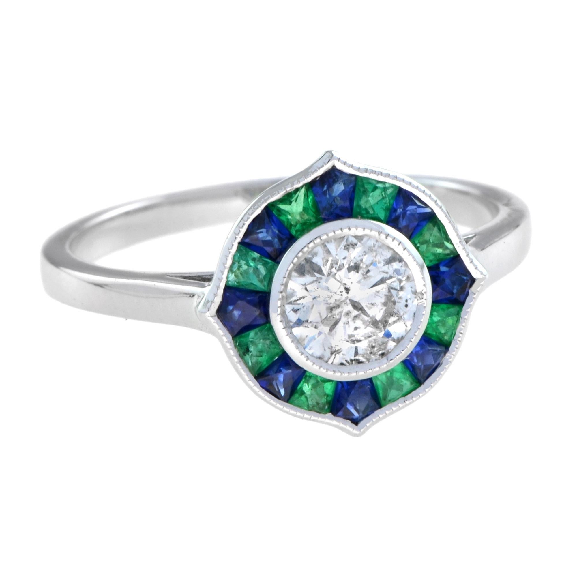 This stunning halo ring sparkles in lustrous 14k white gold and features a 0.52 carat round diamond at the center with French cut emerald and sapphire in beautiful halo designs. Adorn yourself with an Art Deco inspired jewelry in every occasion in