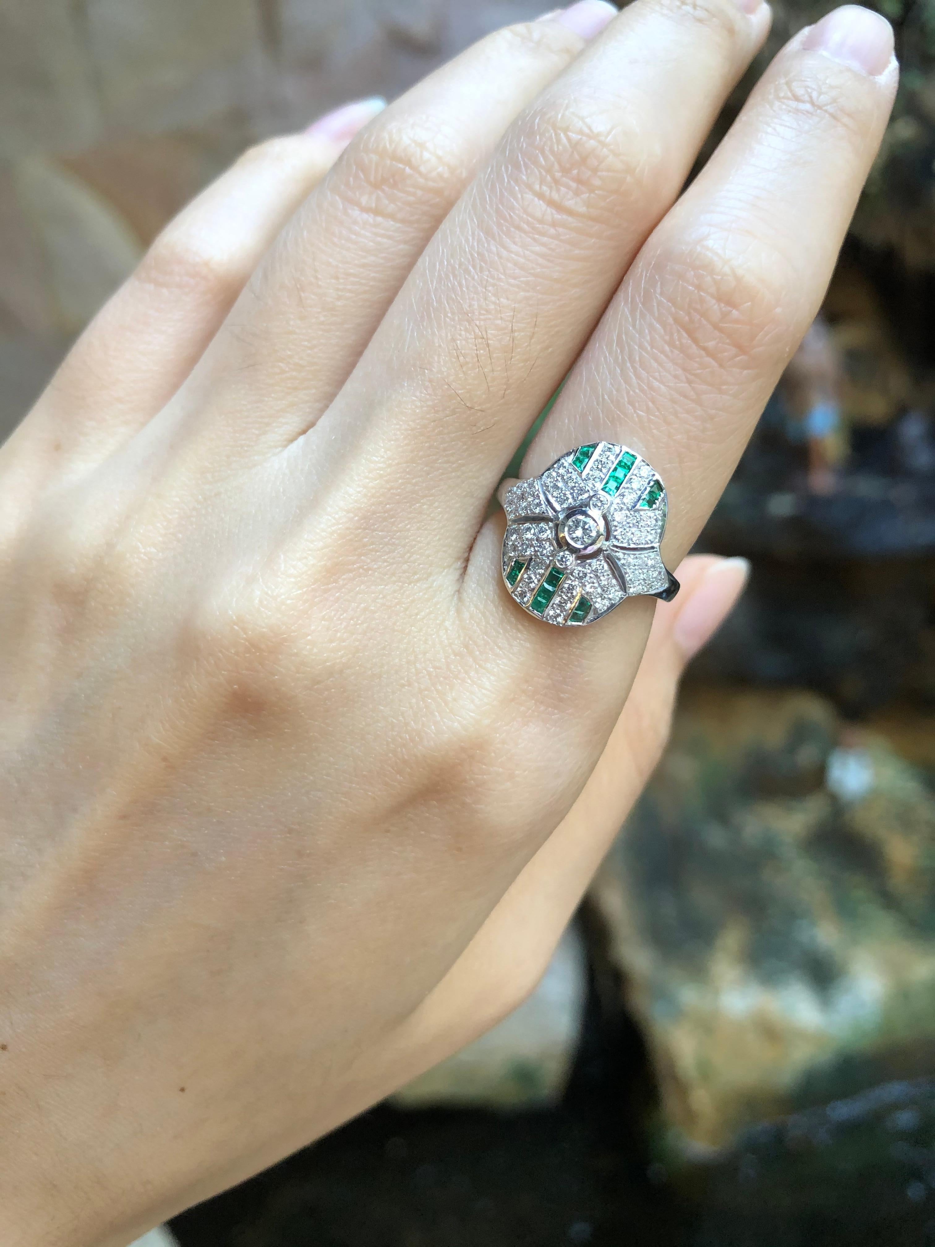 Diamond 0.51 carat with Emerald 0.37 carat Ring set in 18 Karat White Gold Settings

Width:  2.3 cm 
Length: 1.6 cm
Ring Size: 51
Total Weight: 4.13 grams


