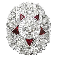 Anello con diamante e rubino incastonato in oro bianco 18 carati