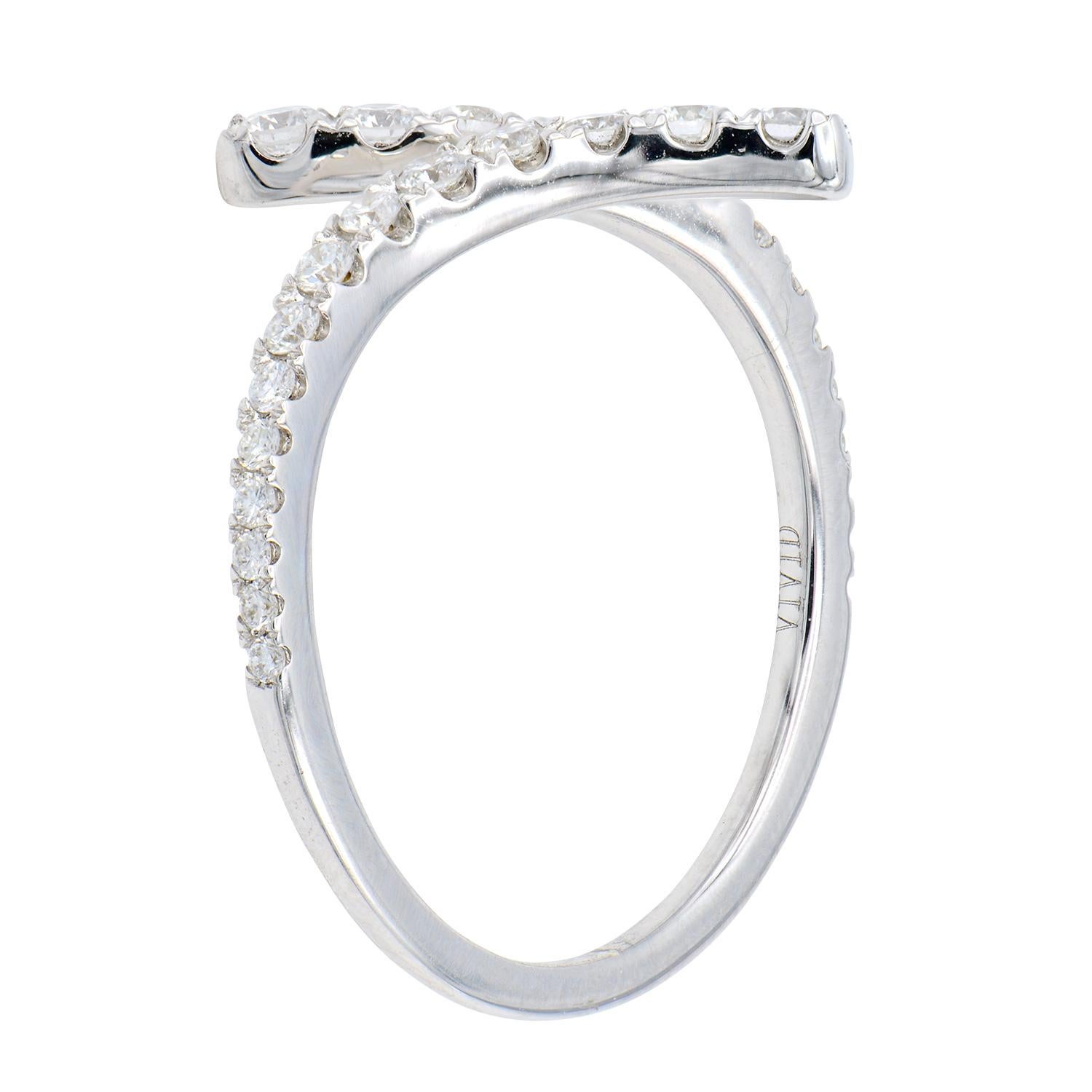 This modern fun ring is made from 28 round VS2, G color diamonds that go halfway around the ring totaling 0.45 carats. The diamonds are set in 2.4 grams of 18 karat white gold. This ring is size 6.5.