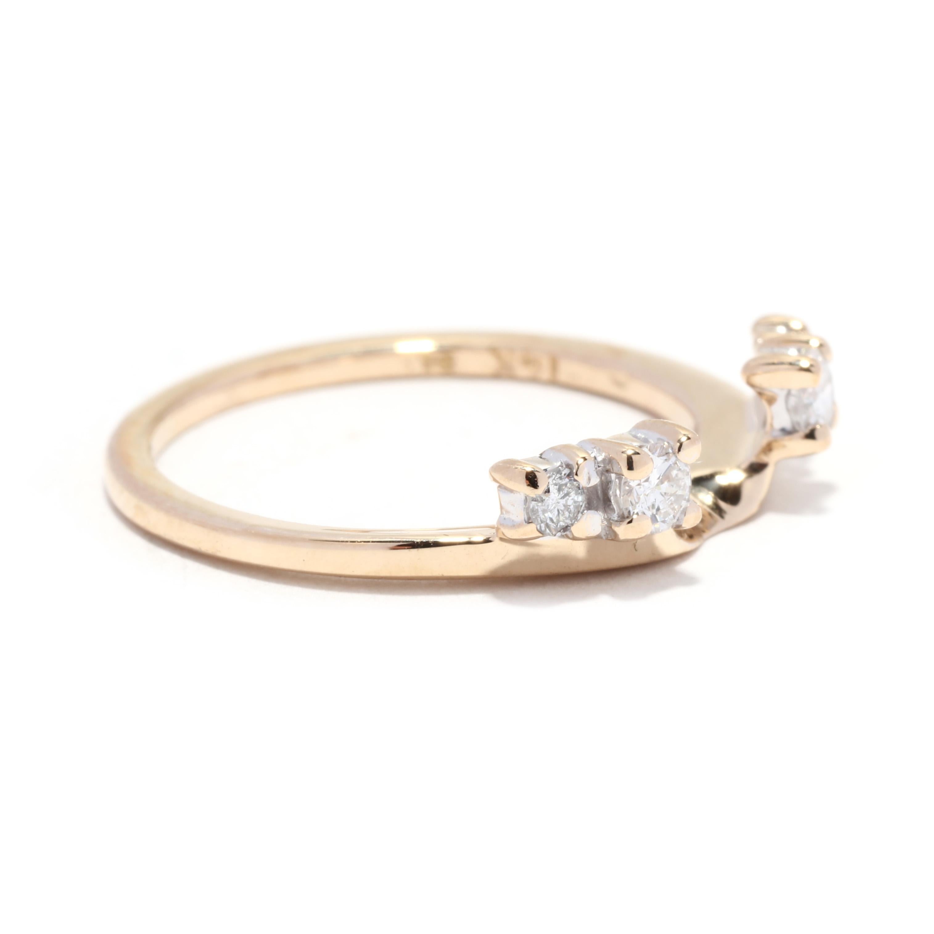 A 14 karat yellow gold diamond wrap ring guard. This stackable ring jacket features two round brilliant cut diamonds on either side weighing approximately .16 total carats with a center space to go around a solitaire ring.

Stones: 
- diamonds, 4