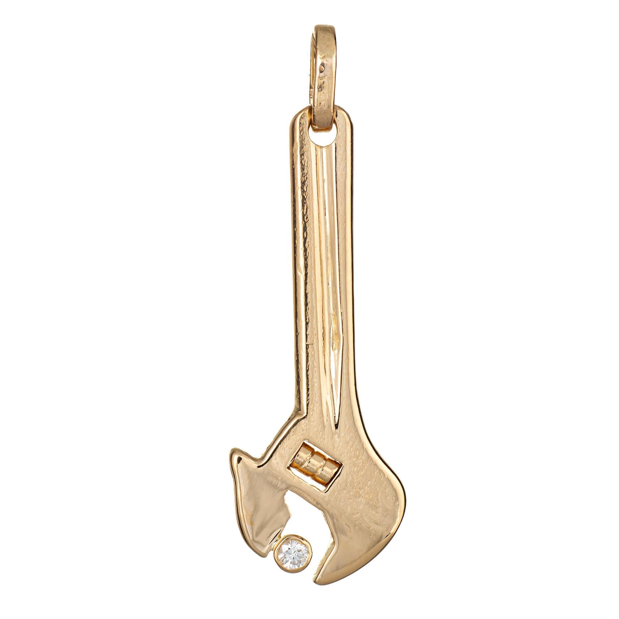 gold wrench pendant