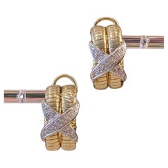 Pendientes de aro X de diamante en oro amarillo y blanco de 18k