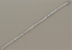 Diamond “XO” Gold Tennis Bracelet