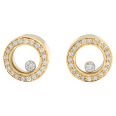 Boucles d'oreilles en or jaune 18K avec diamants