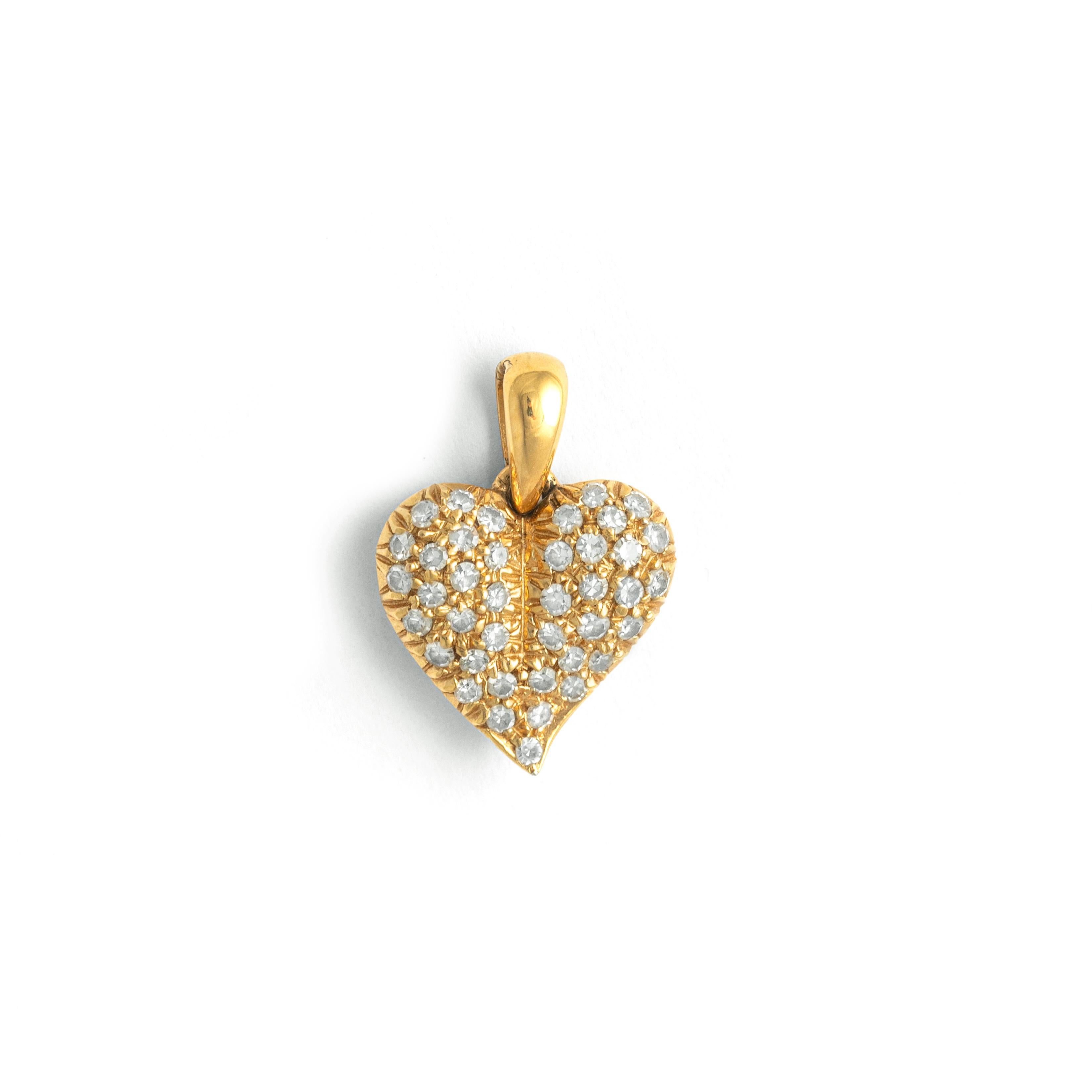 Diamond Yellow Gold 18K Heart Design Pendant.
Height: 1.60 centimeters.
Width: 1.10 centimeters.
Depth: 0.40 centimeters.

Weight: 1.96 grams.
