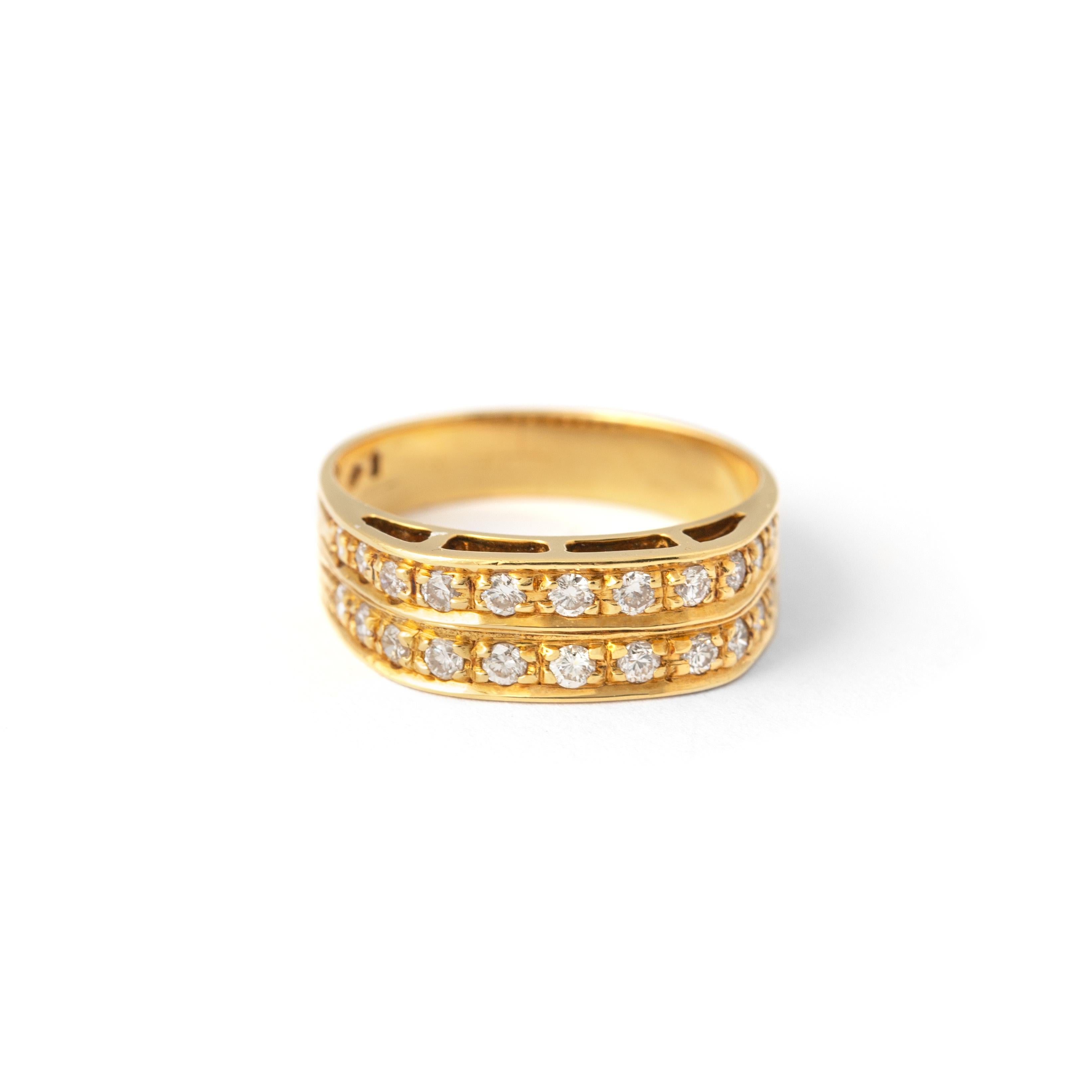 Diamond Yellow Gold 18K Ring.
Set by Diamond of 0,33 carat estimated F color and VVS clarity. 
Size: 4.5
Total gross weight: 3.07 grams.
