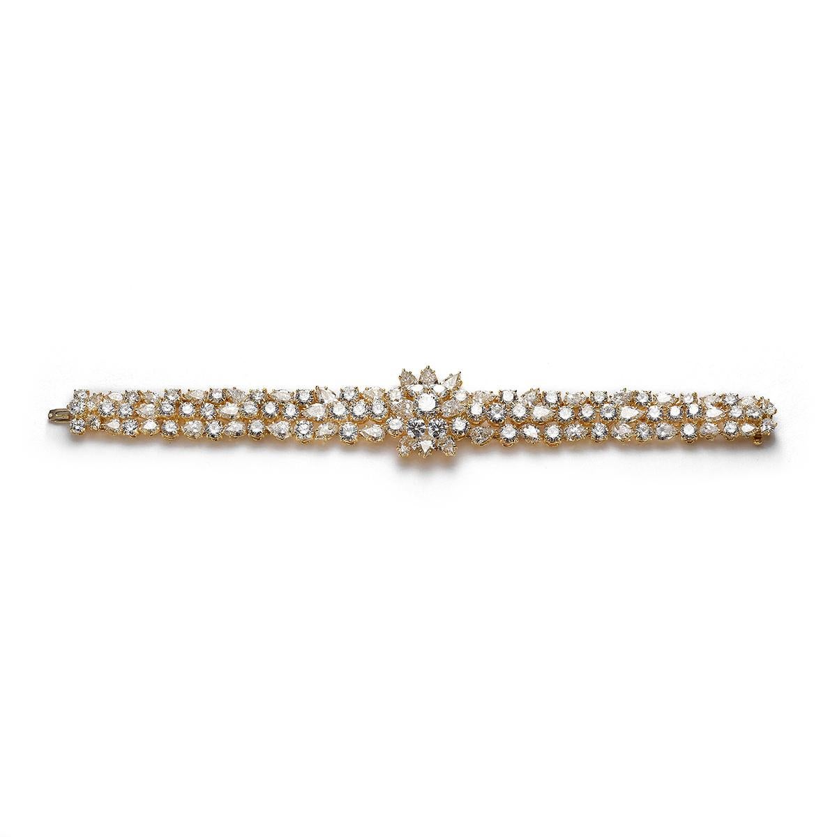 Bracelet in 18kt yellow gold set with one diamond 1.33 cts GVS2 and 103 round and pear-shaped cut diamonds 42.88 cts  