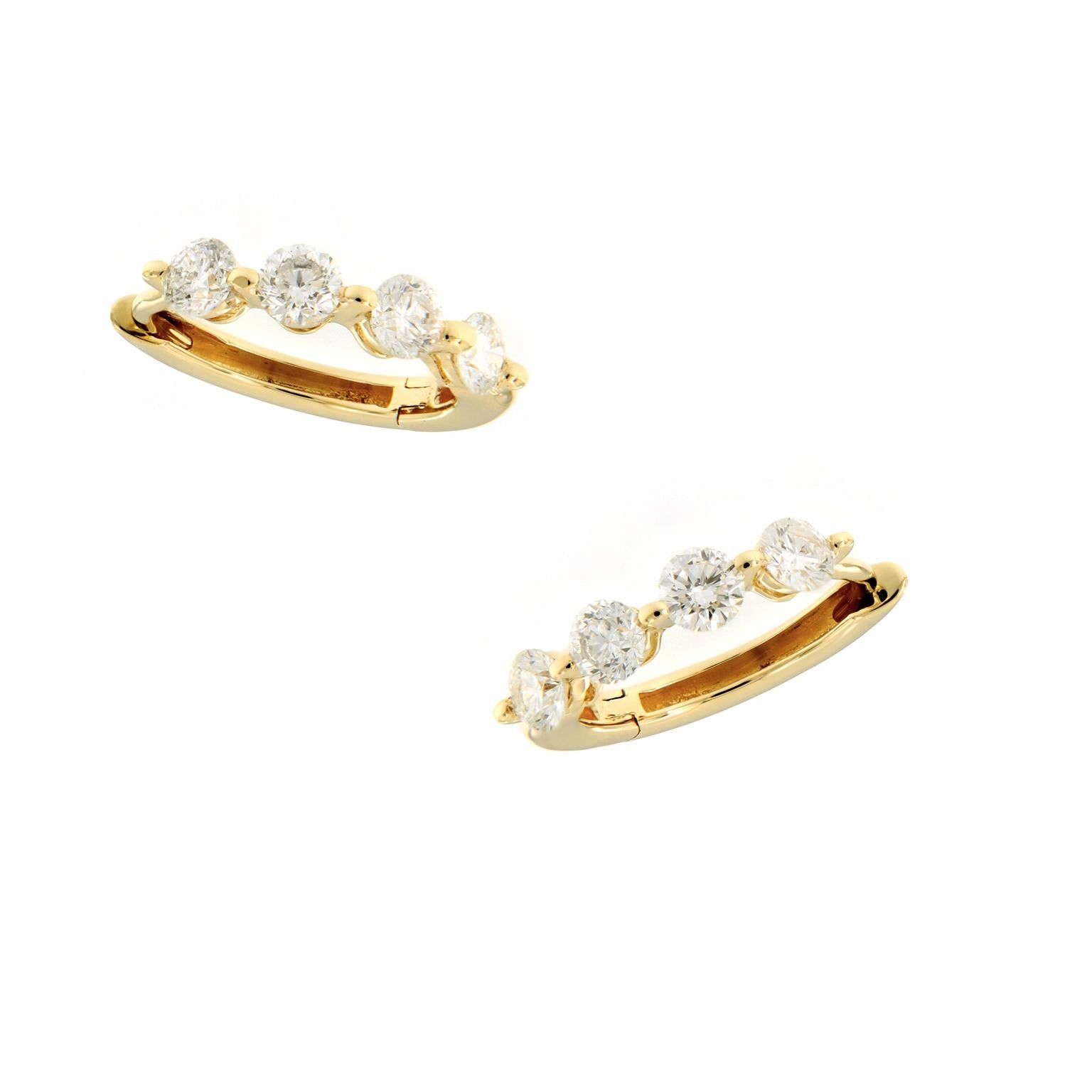Lovely diamond huggy earrings perfect for every day & will be the most comfortable earrings you own! Crafted in 18k yellow gold, each earring has four round brilliant cut diamonds set in one shared prong. Can be worn diamonds forward or solid gold