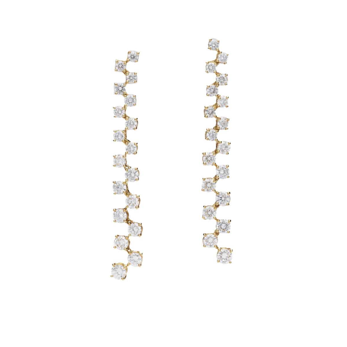 Introducing a pair of magnificent earrings that epitomize opulence and elegance: crafted in 18kt yellow gold and set with a stunning collection of diamonds. These exquisite earrings feature 36 meticulously selected diamonds, with a total weight of