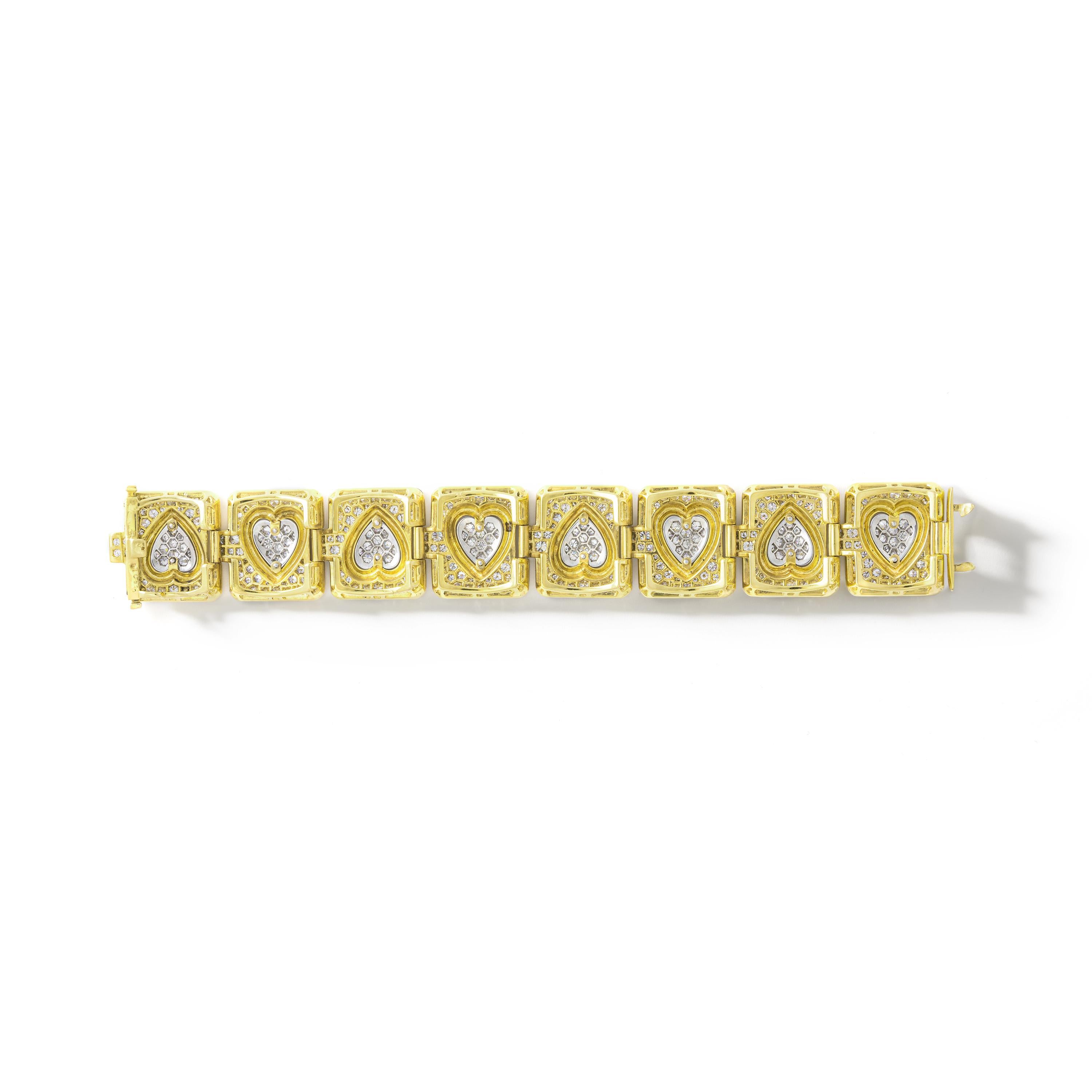The combination White and Yellow is back. We love, love and love!
Heart shapes in platinum and diamond on a yellow gold bracelet.
French marks, circa 1980.

Total weight of the diamonds: approximately 23.00 carats.

Measures:
Length: 18 centimeters