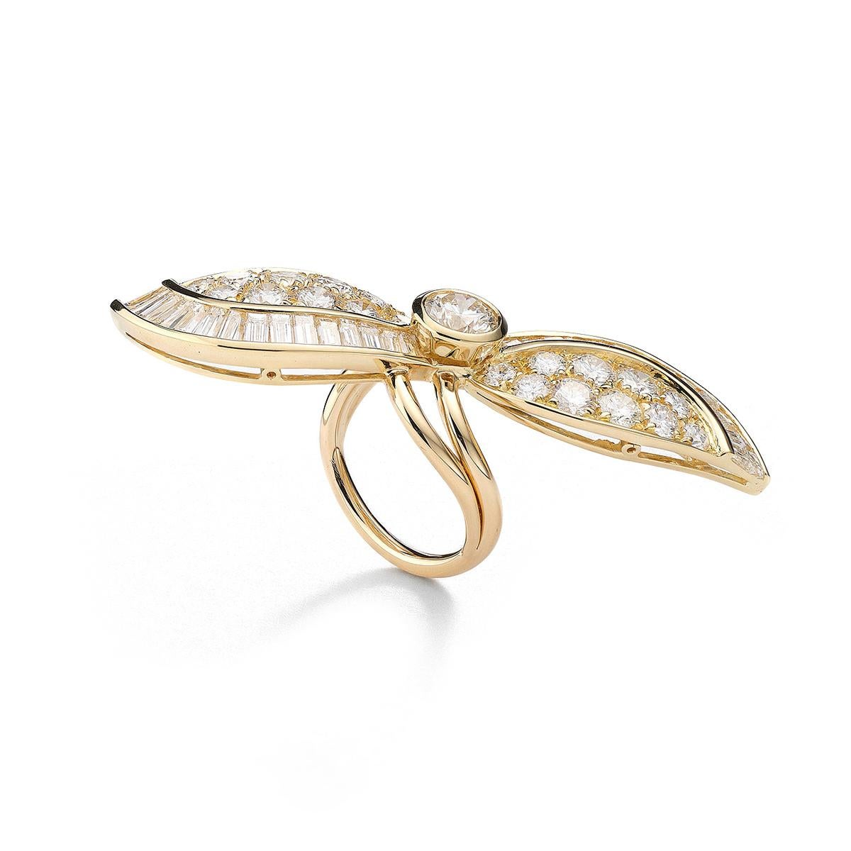Ring in 18kt yellow gold set with one diamond 1.14 cts, 20 diamonds 3.16 cts and 30 tapers cut diamonds 3.30 cts Size 53