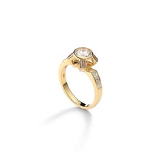 Anello con diamante in oro giallo