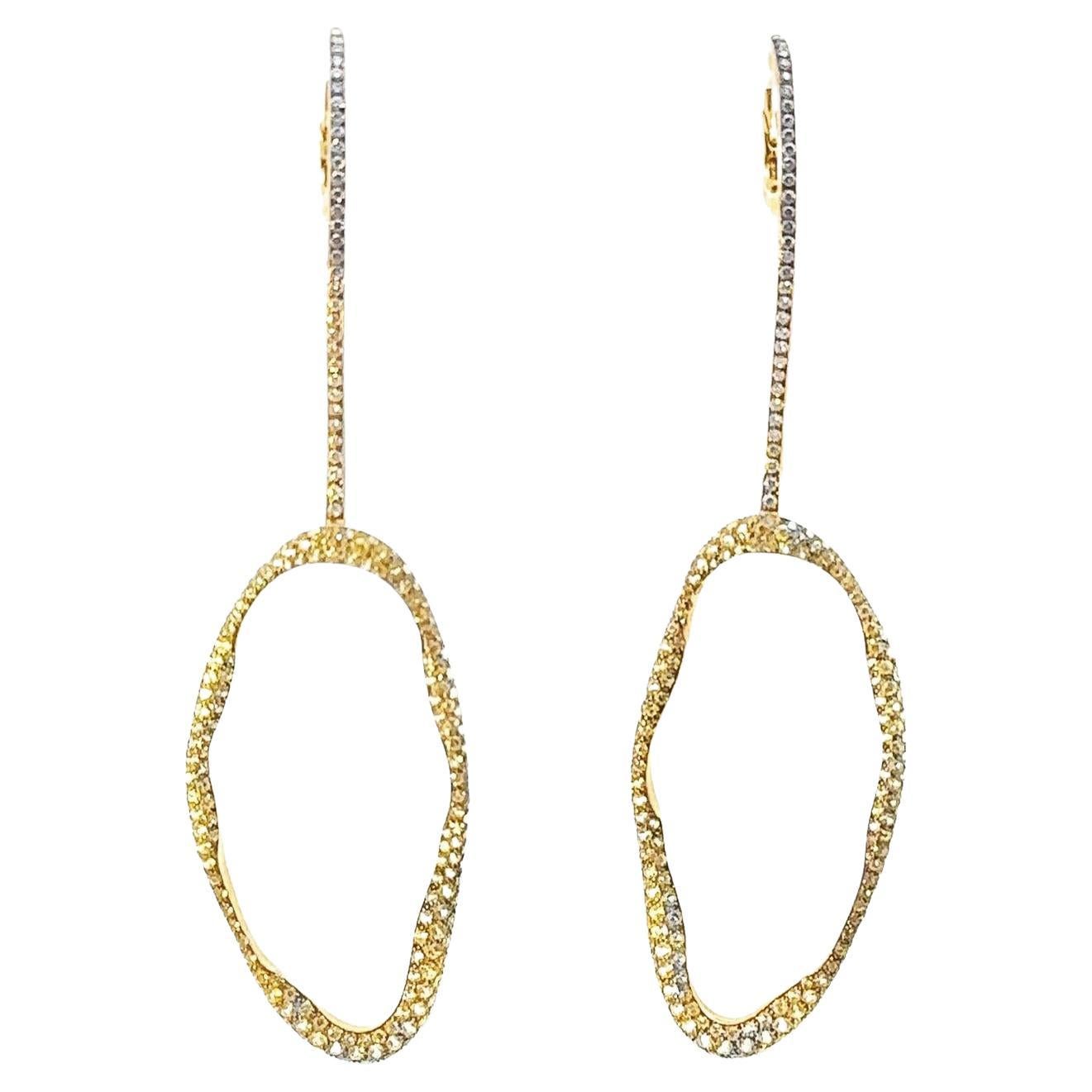 Boucles d'oreilles pendantes en or jaune 18k avec diamant et saphir jaune