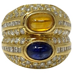 Bague jumelle en or jaune avec diamants, saphirs jaunes et saphirs bleus