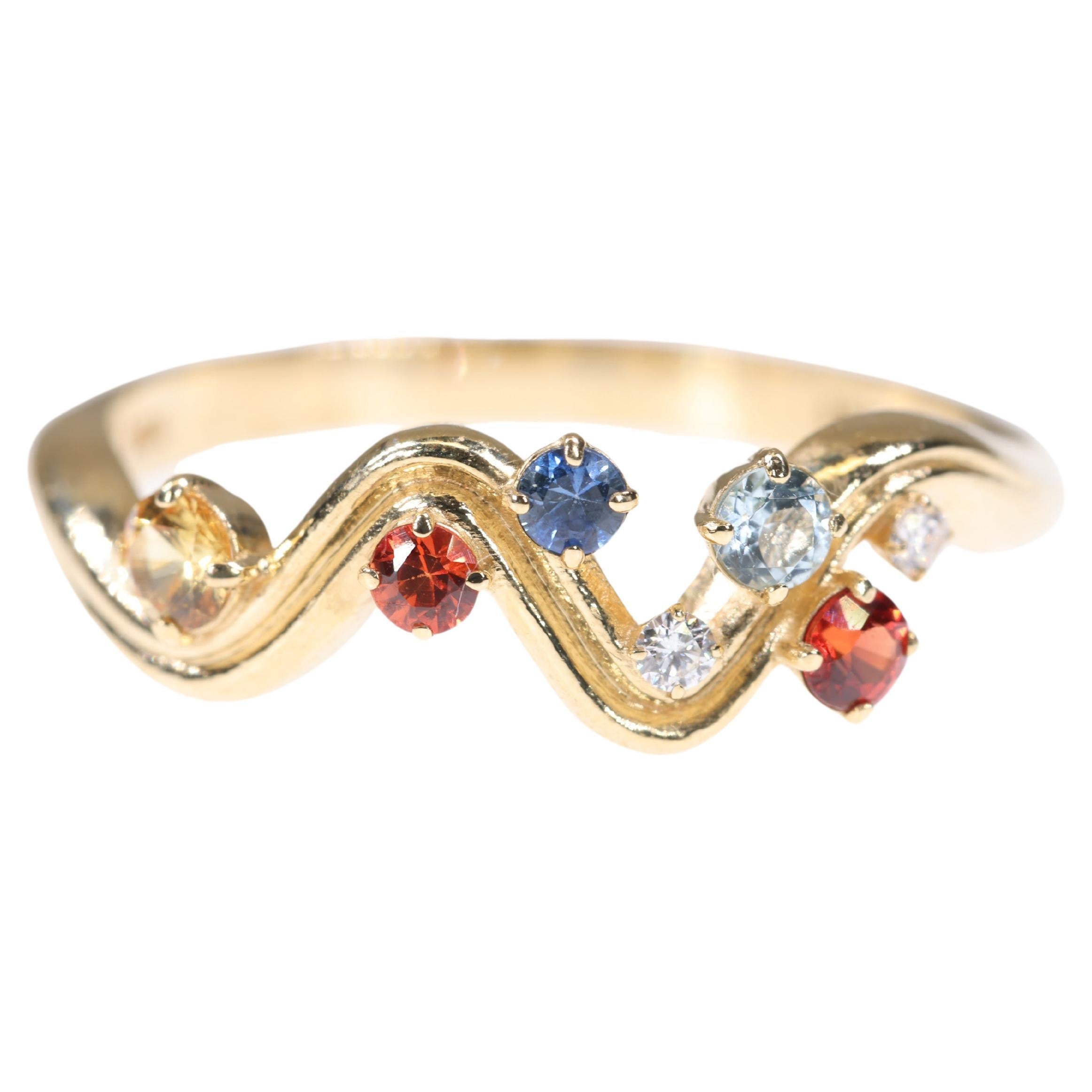 Diamond, Yellow Sapphire, Blue Sapphire, Red Sapphire 18K Yellow Gold Wave Ring  For Sale