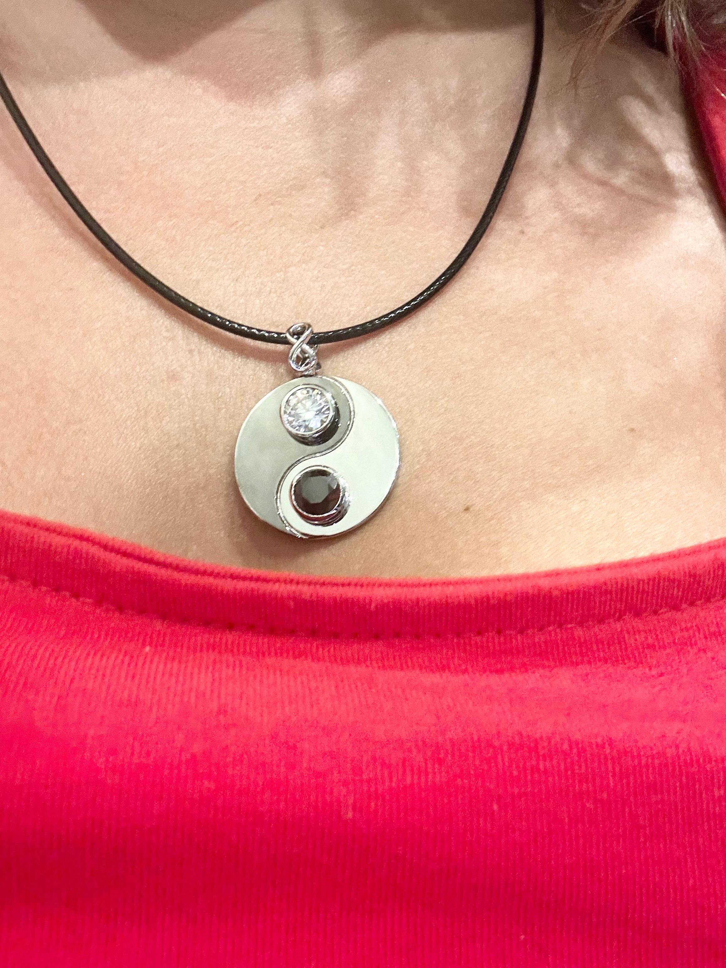 One of a kind pendant necklace made with 1.50ct black diamond and 1ct white diamond (Si clarity and G color) This Ying Yang pendant is made with white and black gold in 14KT. Comes with leather necklace 20