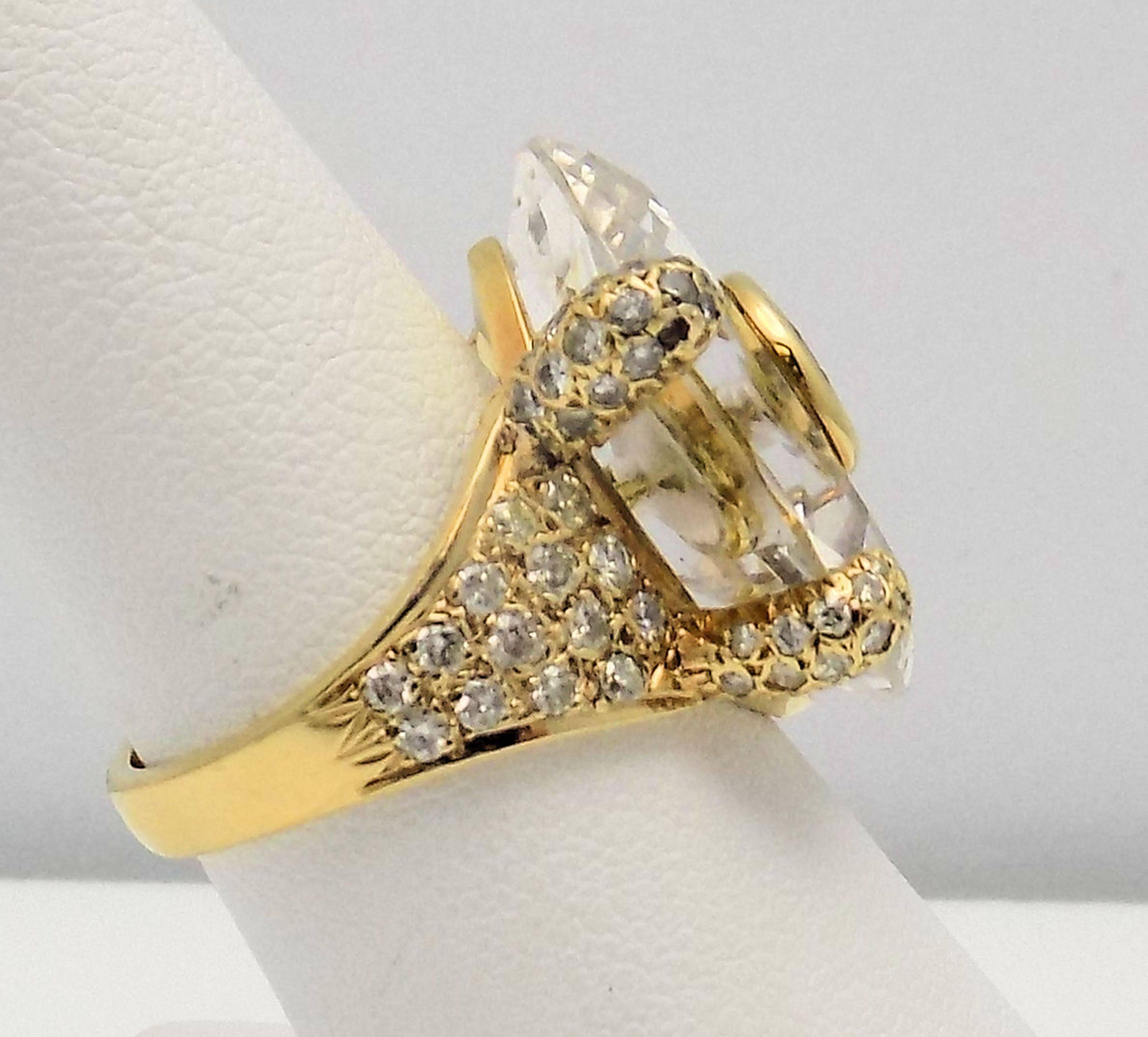 Very Stylish 18 Karat Yellow Gold Ring with 1 Round Brilliant Fancy Yellowish Brown Diamond, 0.70 Carat SI, 92 Round Brilliant Diamonds, 1.04 Carat Total Weight SI-1, H, and Hexagonal Faceted Quartz. Size: 6.5. 6.3 DWT or 12.90 Grams.