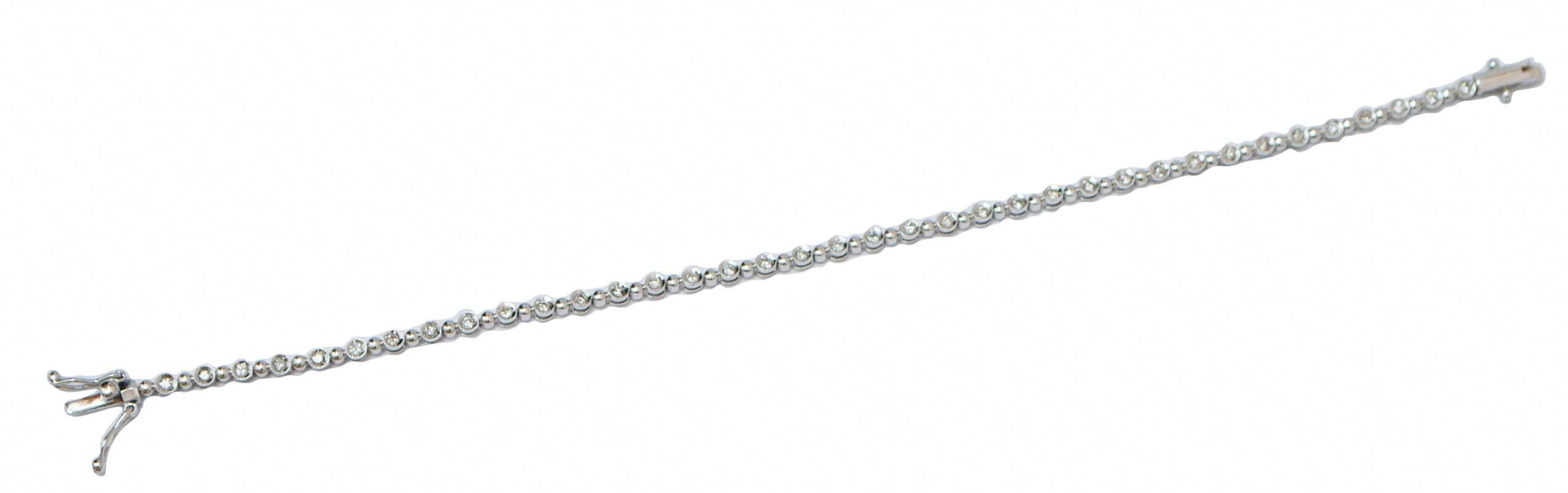 Amazing bracelet in 14 kt white gold structure mounted with diamonds.
This bracelet was totally handmade by Italian master goldsmiths and it is in perfect conditions.
Diamonds 0.70 ct
Total Weight 5.10 gr
RF  +UROG
RK. AUCC90

For any informations,