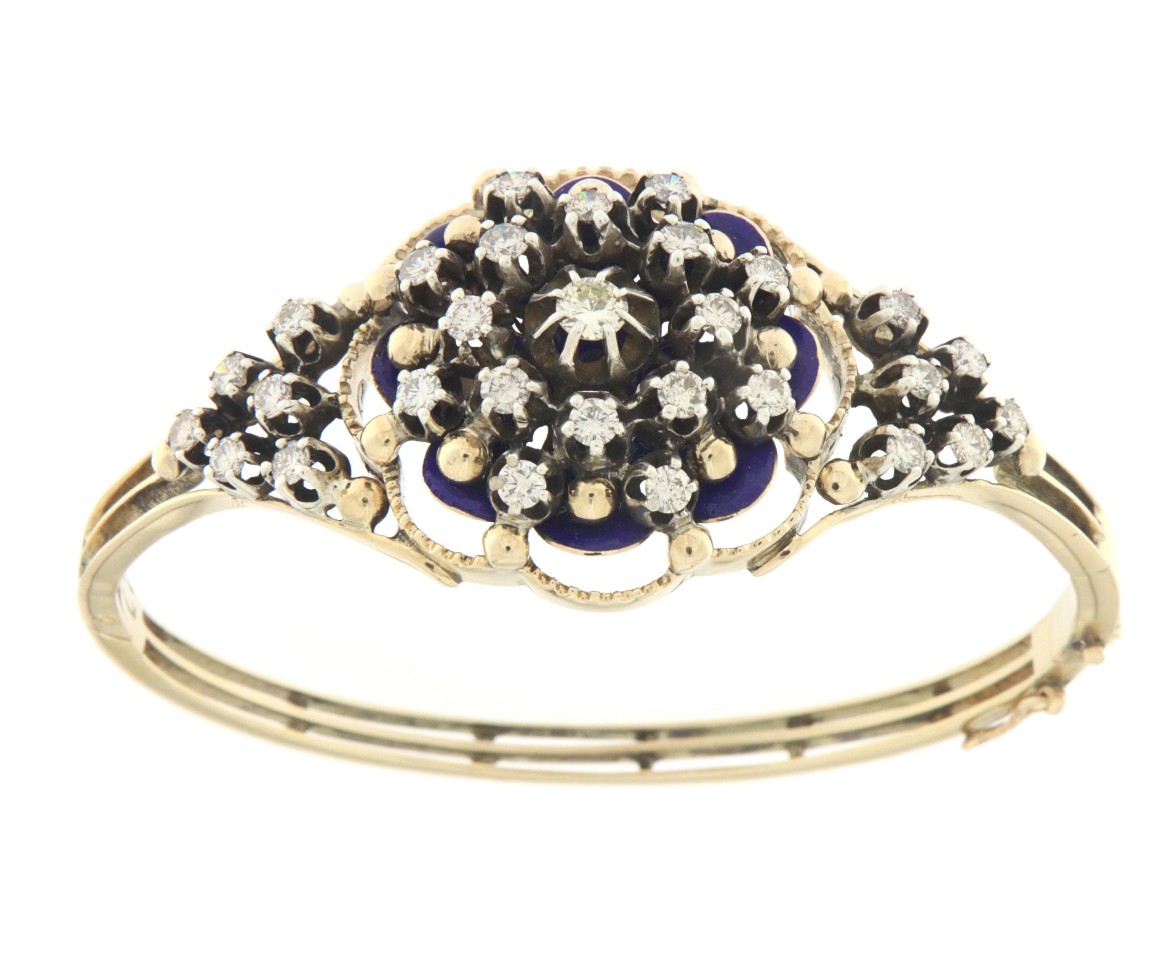 14 karat yellow gold and 800 thousandths silver bracelet completely handmade in the 1950s, studded with diamonds and blue enamel

Bracelet total weight 26.40 grams 
Diamonds weight 2.90 karat
Size 17 centimetres 
