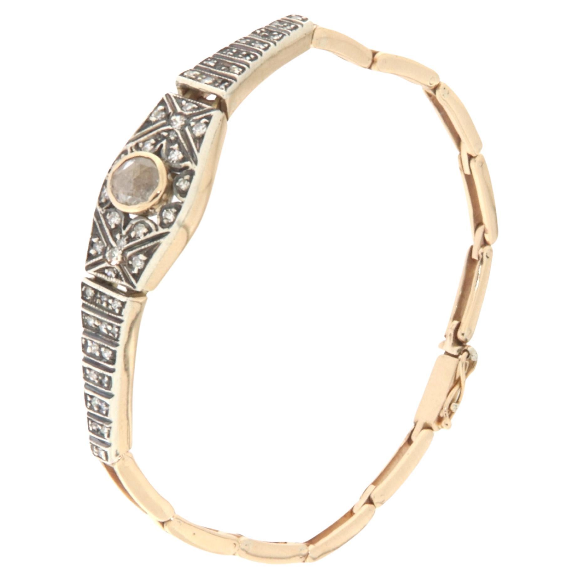 Bracelet manchette en or jaune 14 carats et diamants