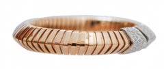 Diamonds, 18 Karat Rose Gold and White Gold Bracelet.