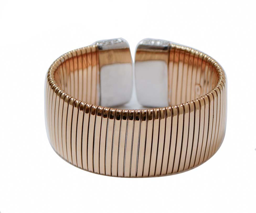 Retro Diamonds, 18 Karat Rose Gold and White Gold TuboGas Bracelet. For Sale