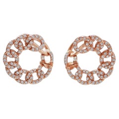 Diamantes, Pendientes modernos de oro rosa de 18 quilates.