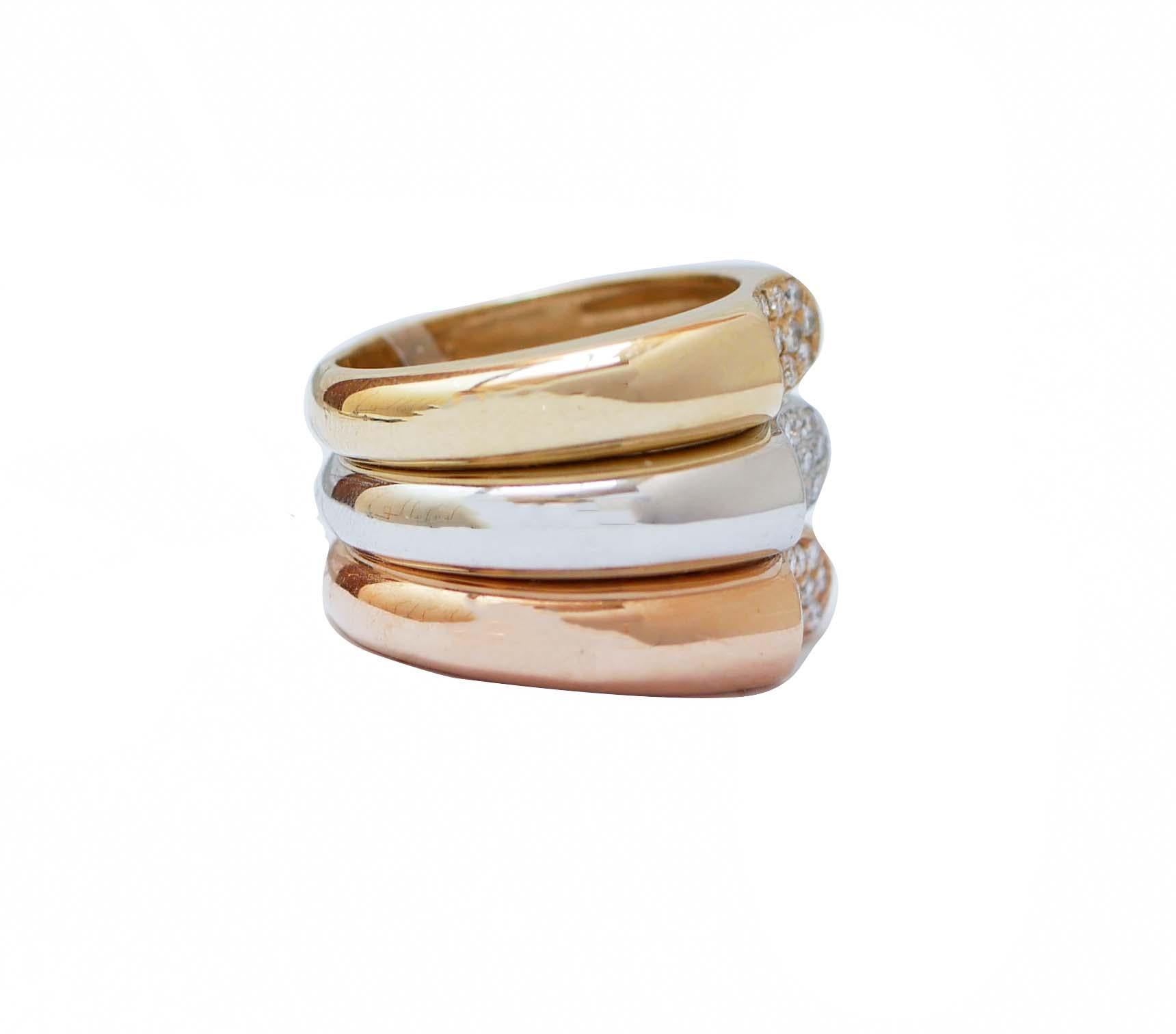 Beautiful three rings in one in 18 kt rose gold,yellow gold and white gold structure mounted with diamonds.
Diamonds 0.63 ct
Total Weight 17 gr
RF      G      CHCO
RK.  GUOU
Italian Size 10
Usa Size 5.25
French Size 50

For any informations, feel